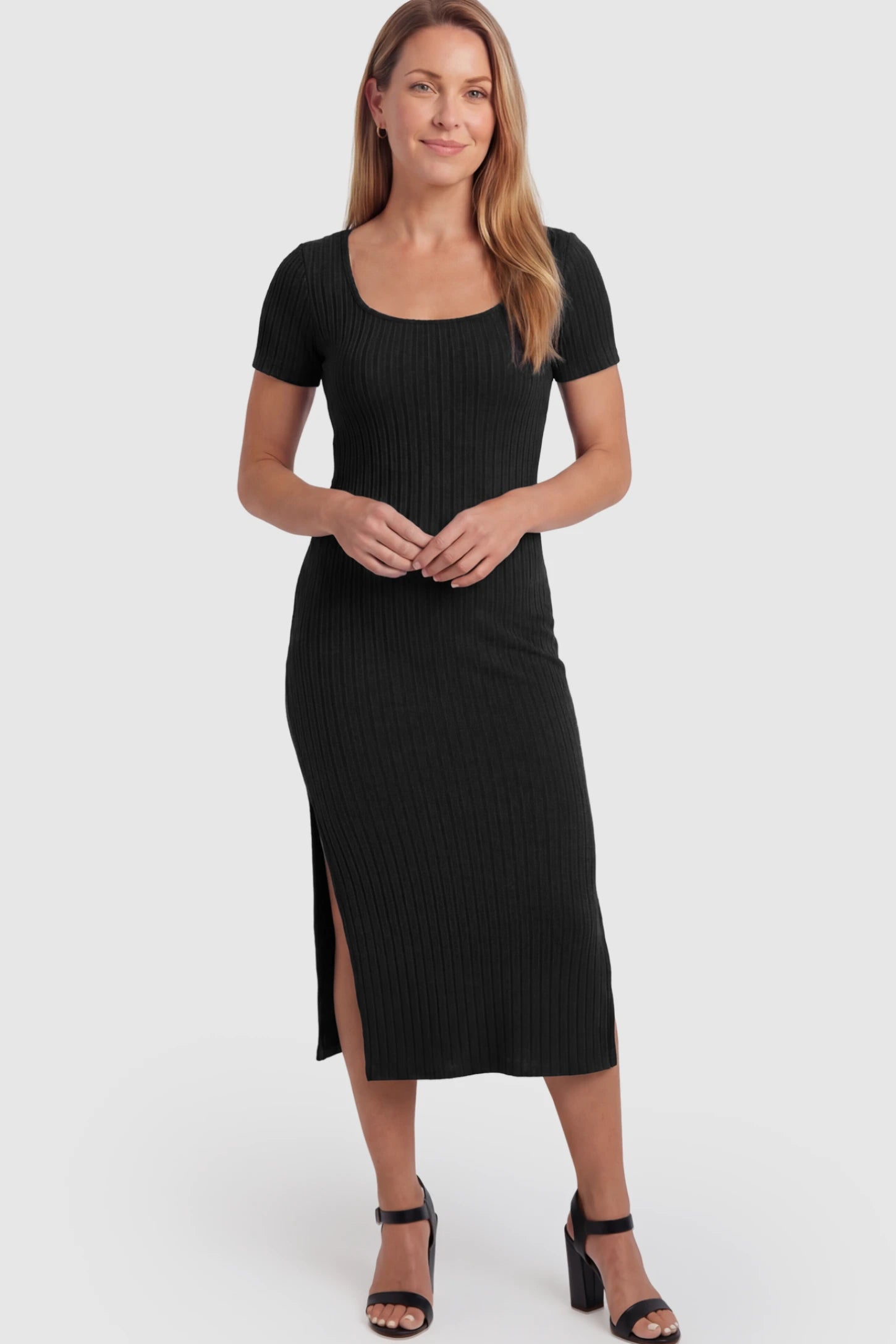 Ribbed Knit Scoop Neck Side Slit Maternity Midi Dress Ribbed Knit Scoop Neck Side Slit Maternity Midi Dress in Black featuring a side slit on a postpartum model.