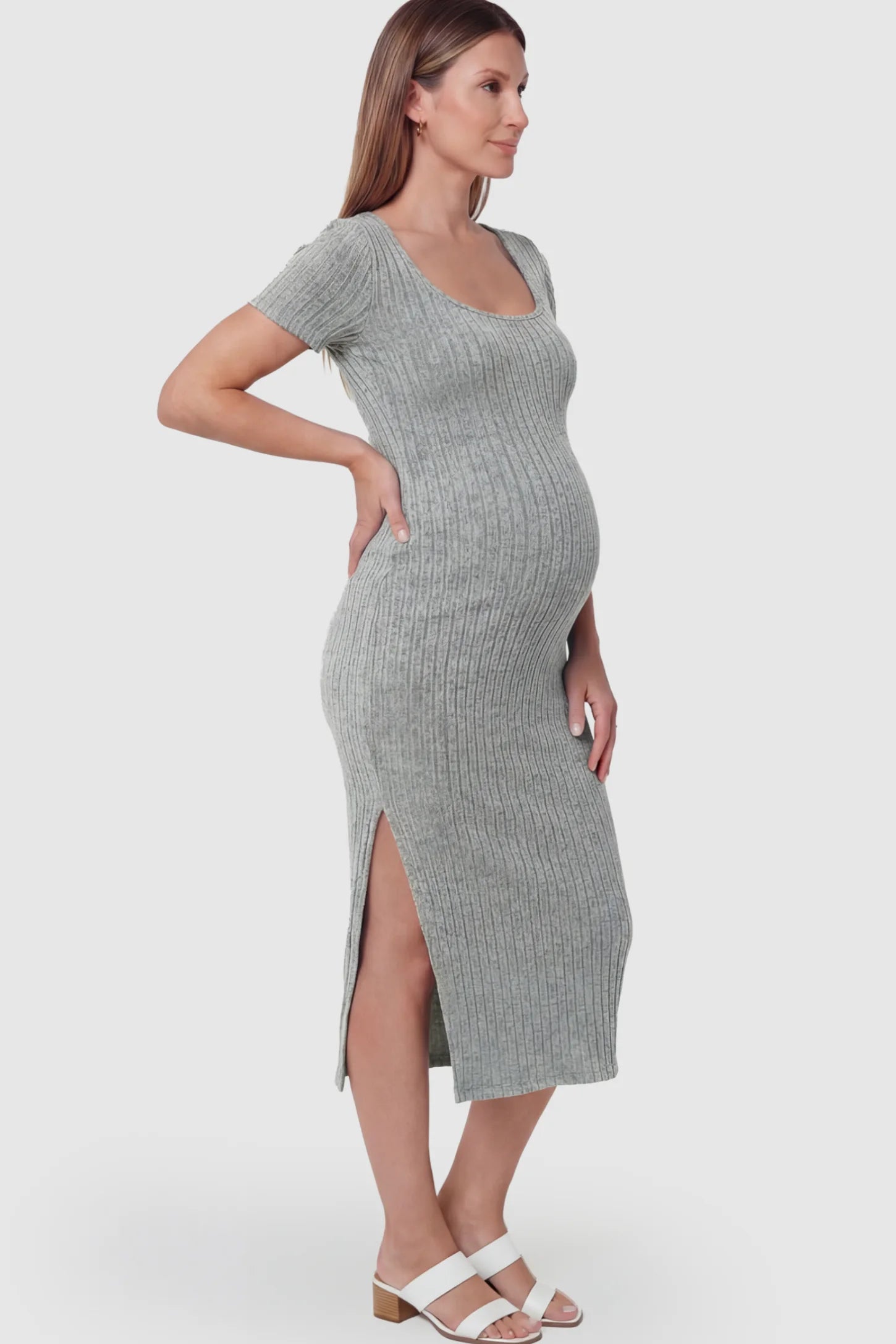 Ribbed Knit Scoop Neck Side Slit Maternity Midi Dress Ribbed Knit Scoop Neck Side Slit Maternity Midi Dress in Light Gray featuring a side slit on a pregnant model.