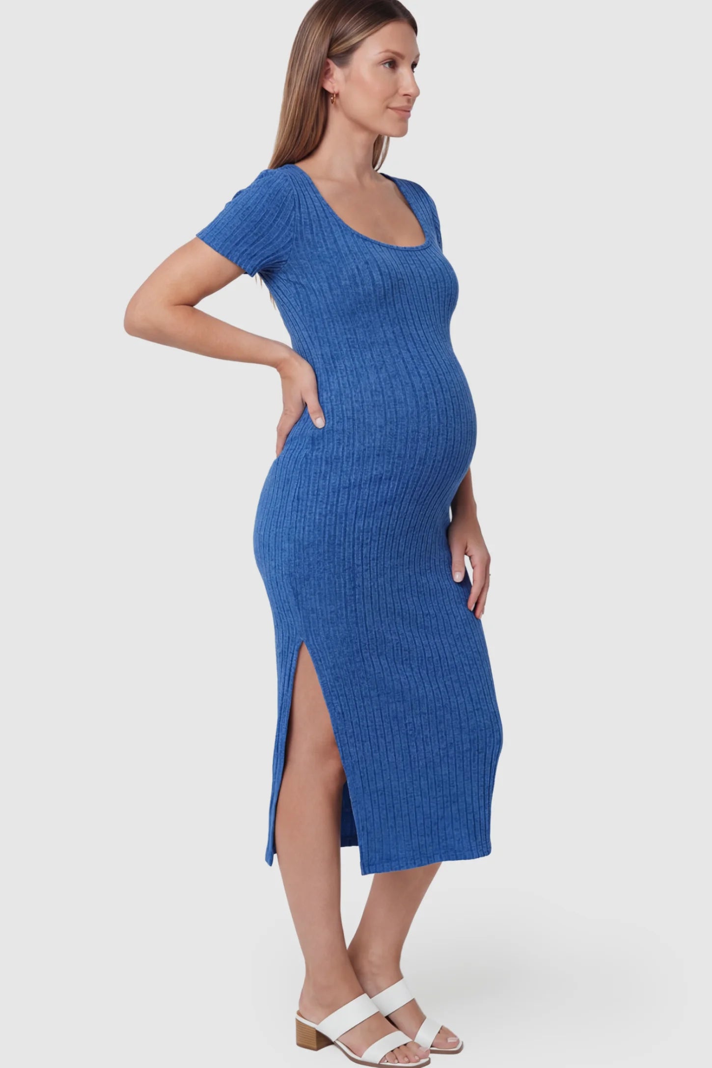 Ribbed Knit Scoop Neck Side Slit Maternity Midi Dress Ribbed Knit Scoop Neck Side Slit Maternity Midi Dress in Sapphire Blue featuring a side slit on a pregnant model.