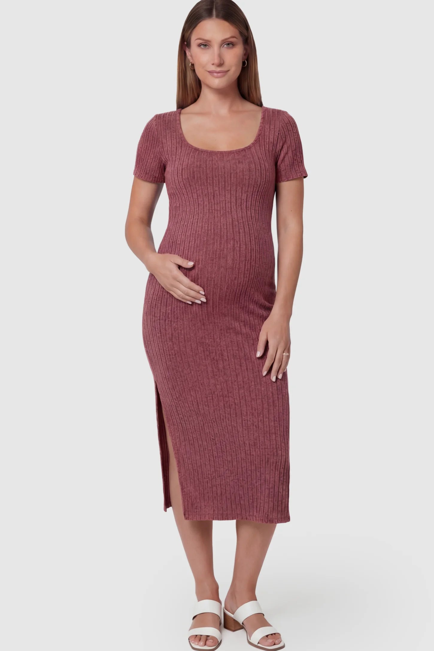 Ribbed Knit Scoop Neck Side Slit Maternity Midi Dress Ribbed Knit Scoop Neck Side Slit Maternity Midi Dress in Wine Red featuring a side slit on a pregnant model.
