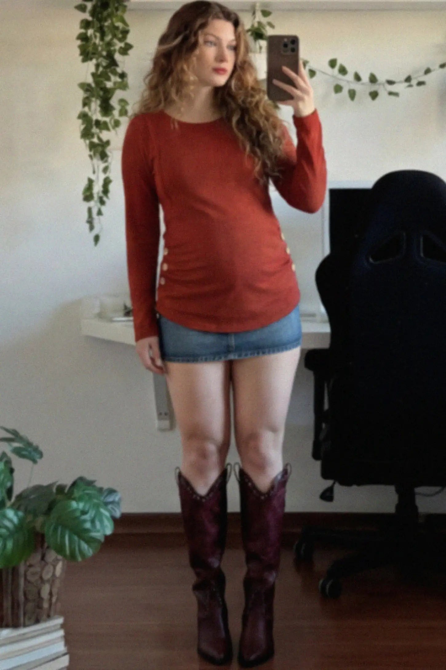 Ribbed Knit Long Sleeve Maternity & Nursing Top Ribbed Knit Long Sleeve Maternity & Nursing Top in Red featuring discreet nursing access on a pregnant model.