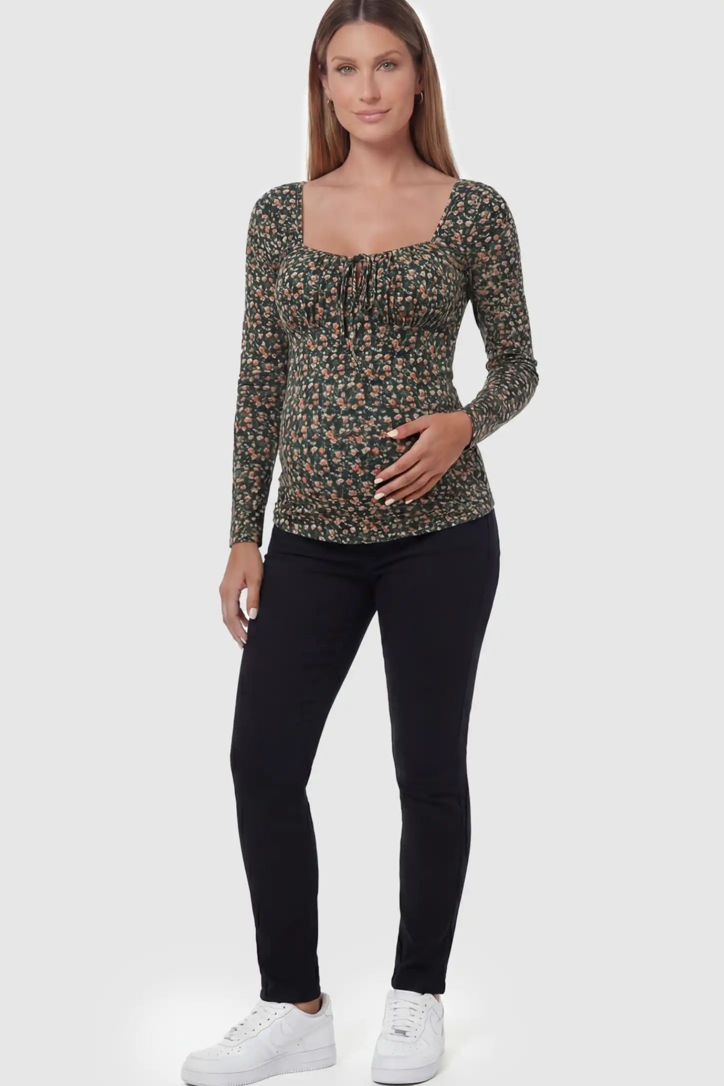 Floral Square Neck Maternity Top Floral Square Neck Maternity Top in floral print featuring a smocked bodice on a pregnant model in a full body image.