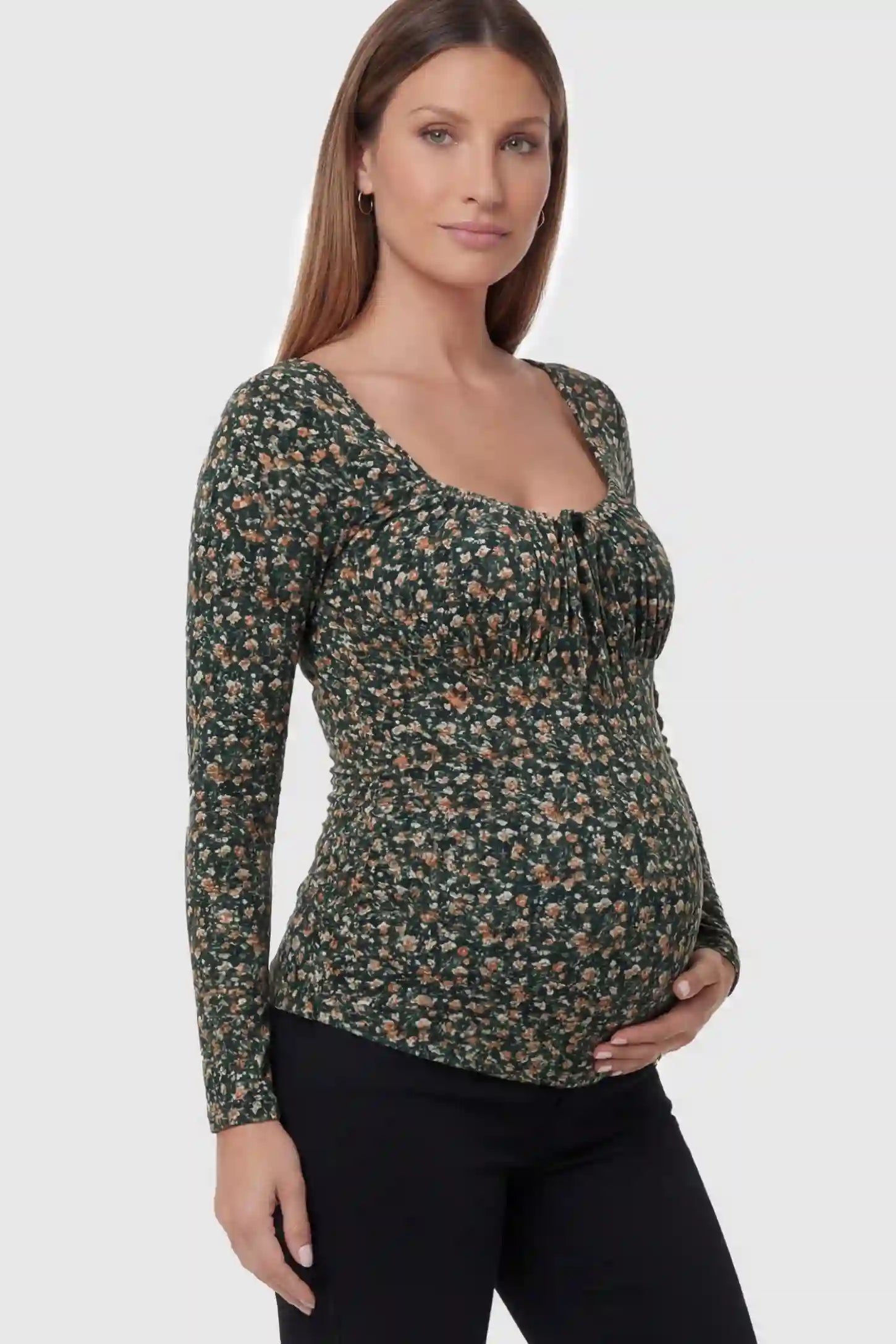 Floral Square Neck Maternity Top in floral print featuring a smocked bodice in side view on a pregnant model.