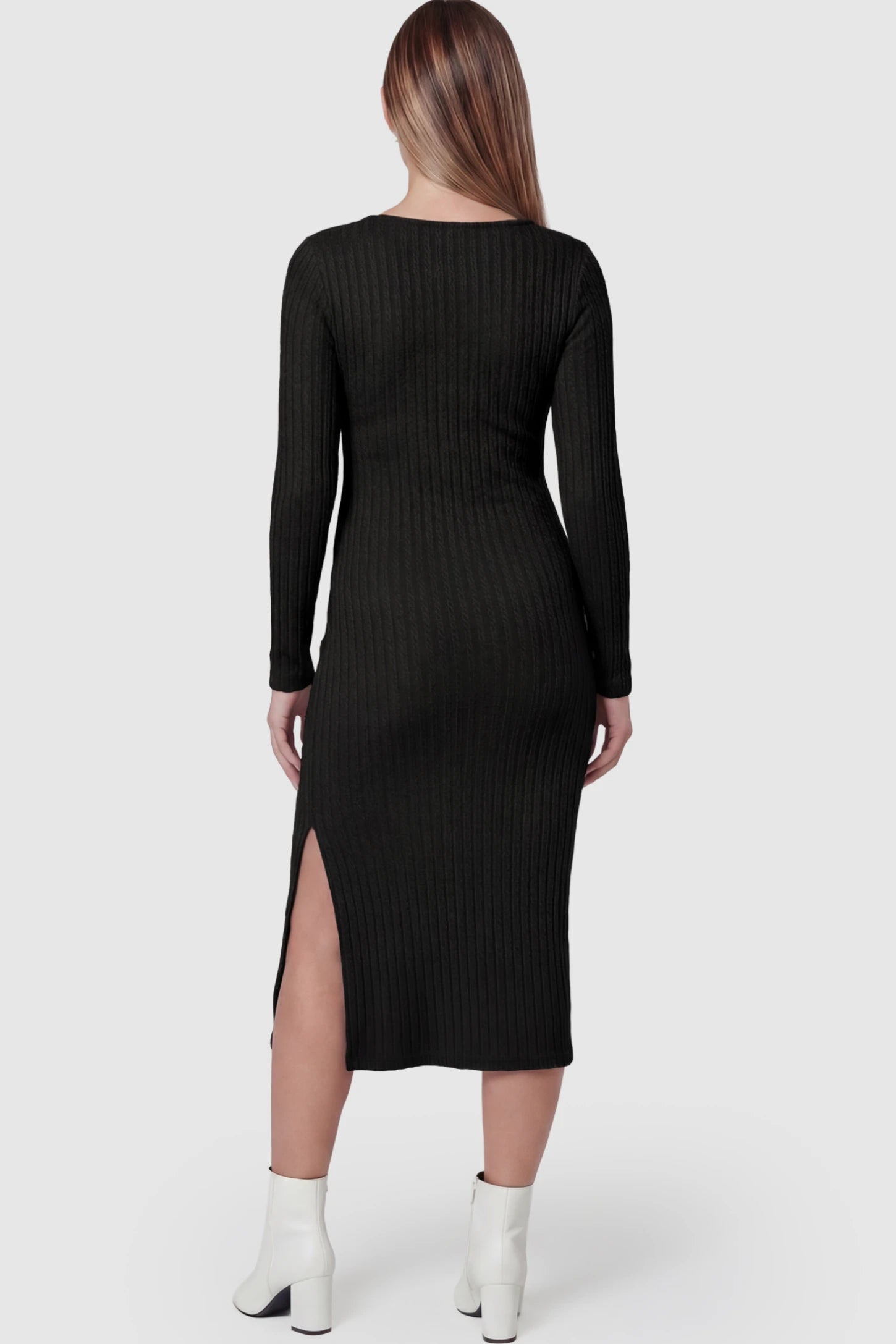 Ribbed Knit Long Sleeve Bodycon Maternity Midi Dress Ribbed Knit Long Sleeve Bodycon Maternity Midi Dress in Black featuring a Side Slit on a pregnant model.