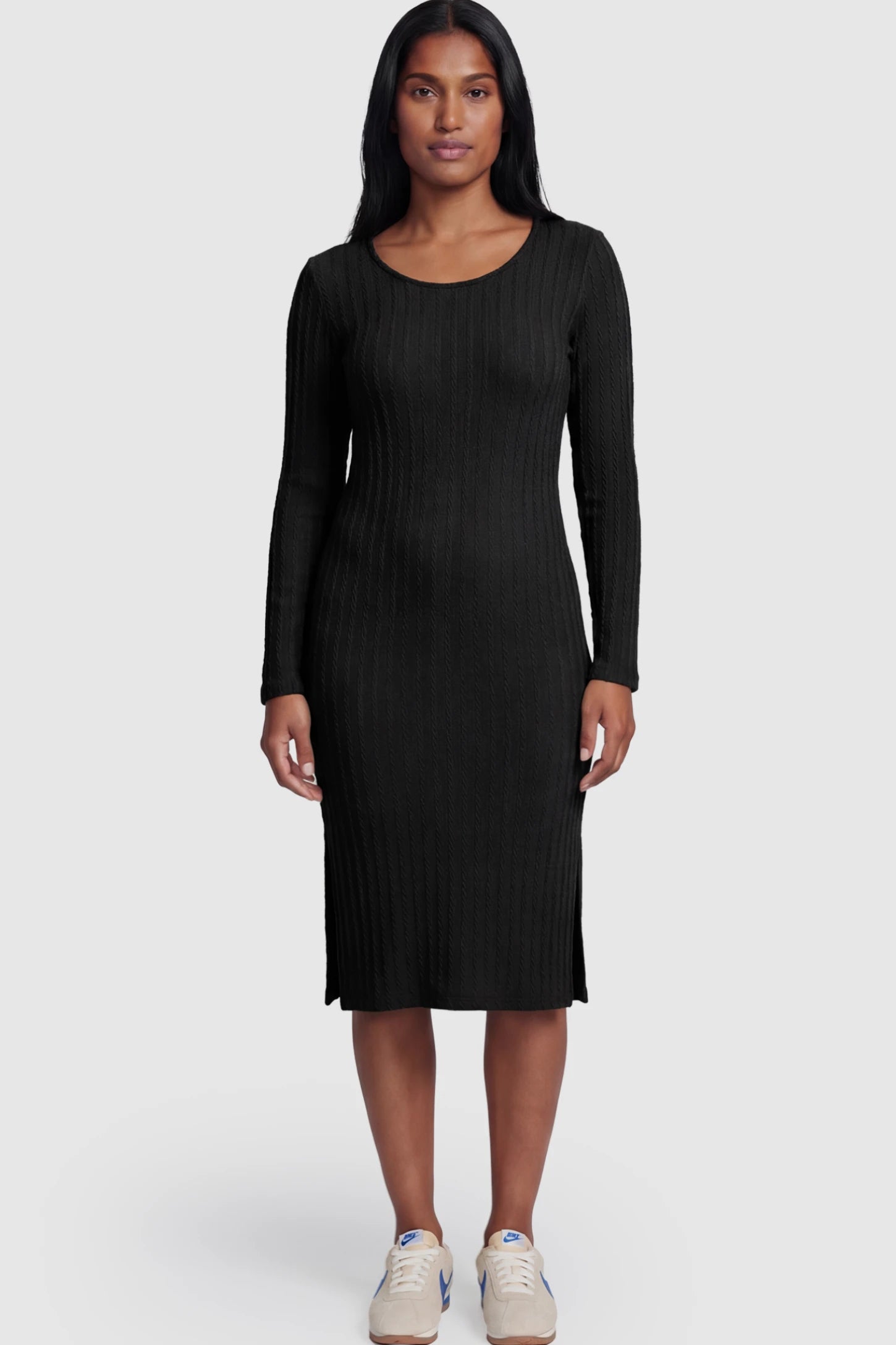Ribbed Knit Long Sleeve Bodycon Maternity Midi Dress Ribbed Knit Long Sleeve Bodycon Maternity Midi Dress in Black featuring a Side Slit on a postpartum model.