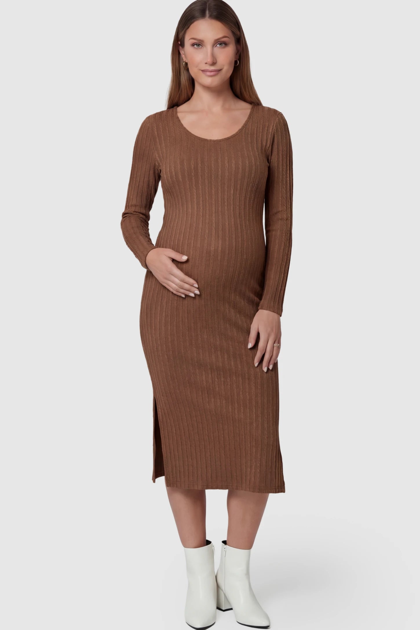 Ribbed Knit Long Sleeve Bodycon Maternity Midi Dress Ribbed Knit Long Sleeve Bodycon Maternity Midi Dress in Brown featuring a Side Slit on a pregnant model.