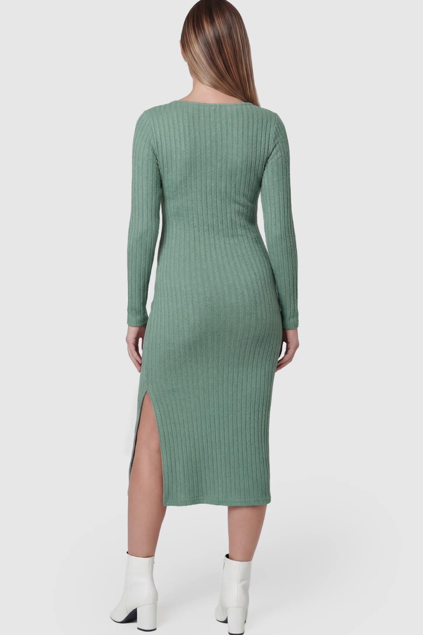 Ribbed Knit Long Sleeve Bodycon Maternity Midi Dress Ribbed Knit Long Sleeve Bodycon Maternity Midi Dress in Green featuring a Side Slit on a pregnant model.