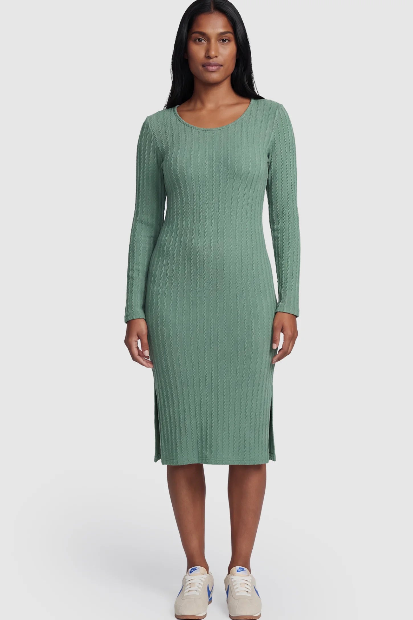 Ribbed Knit Long Sleeve Bodycon Maternity Midi Dress Ribbed Knit Long Sleeve Bodycon Maternity Midi Dress in Green featuring a Side Slit on a postpartum model.