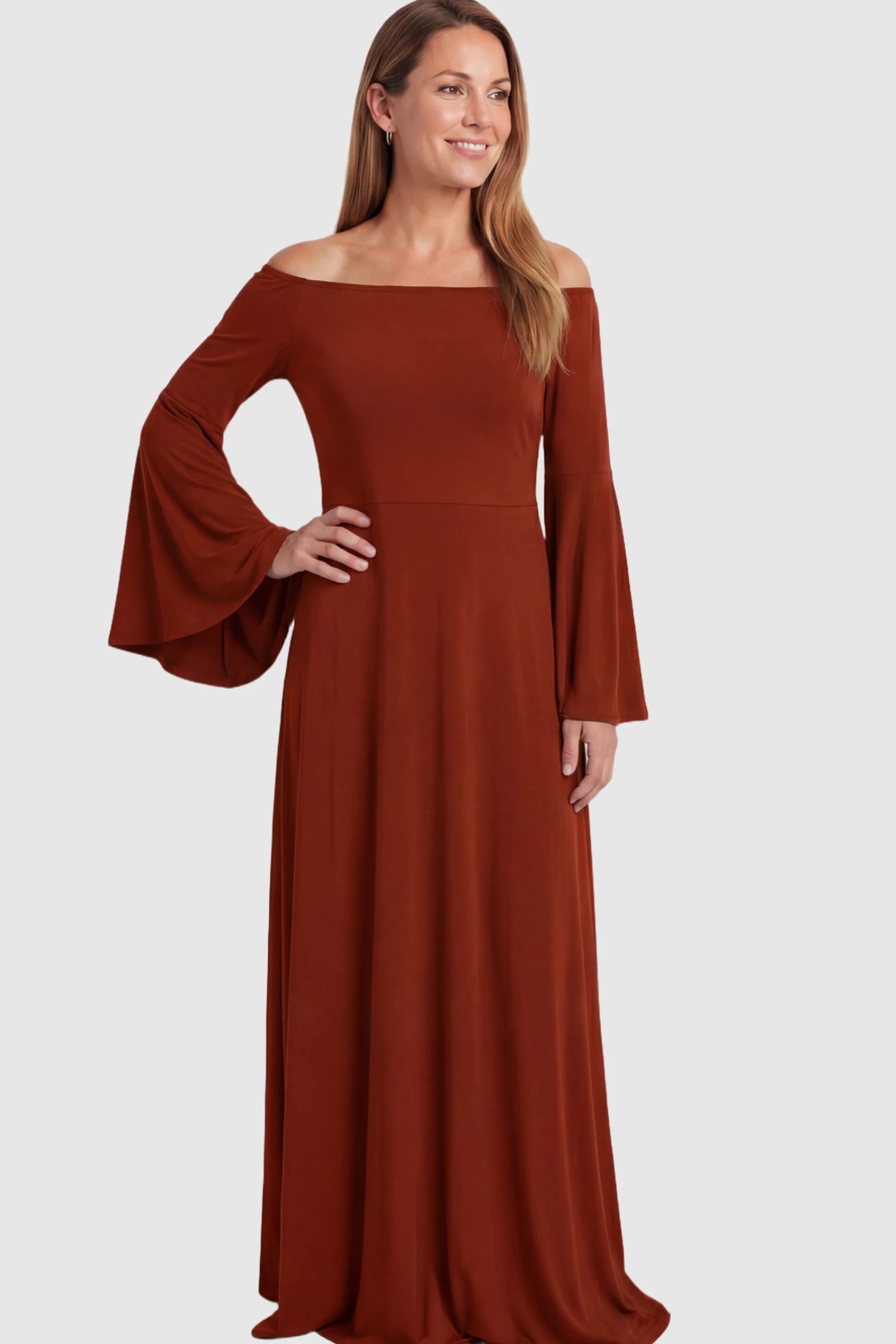 Solid Off Shoulder Bell Sleeve Maternity Maxi Dress Solid Off Shoulder Bell Sleeve Maternity Maxi Dress in Red featuring Bell sleeves on a postpartum model.