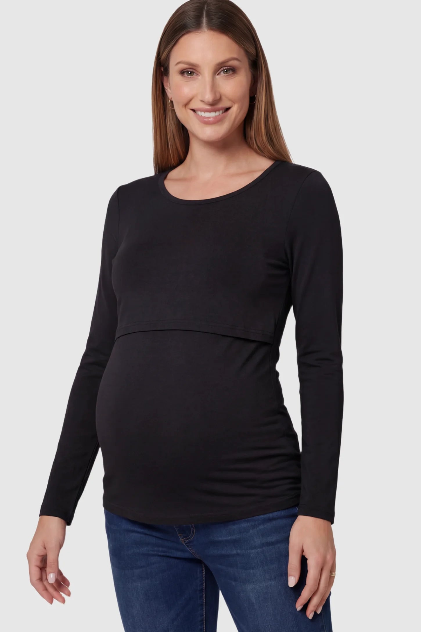 Double Layer Long Sleeve Maternity Nursing Top Double Layer Long Sleeve Maternity & Nursing Top in Black with a discrete lift-up access on a pregnant model.