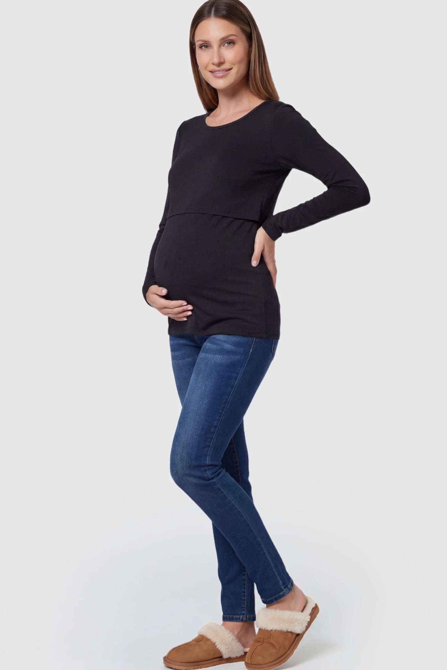 Double Layer Long Sleeve Maternity Nursing Top Double Layer Long Sleeve Maternity & Nursing Top in Black with a discrete lift-up access on a pregnant model.