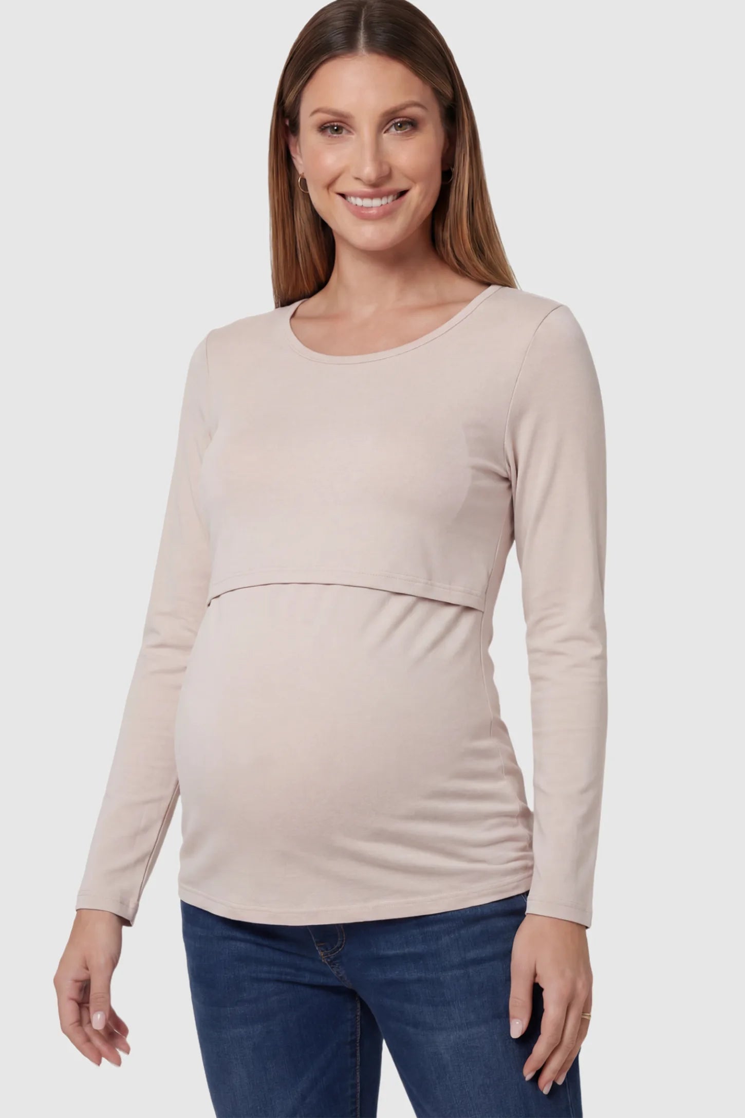 Double Layer Long Sleeve Maternity Nursing Top Double Layer Long Sleeve Maternity & Nursing Top in Nude with a discrete lift-up access on a pregnant model.