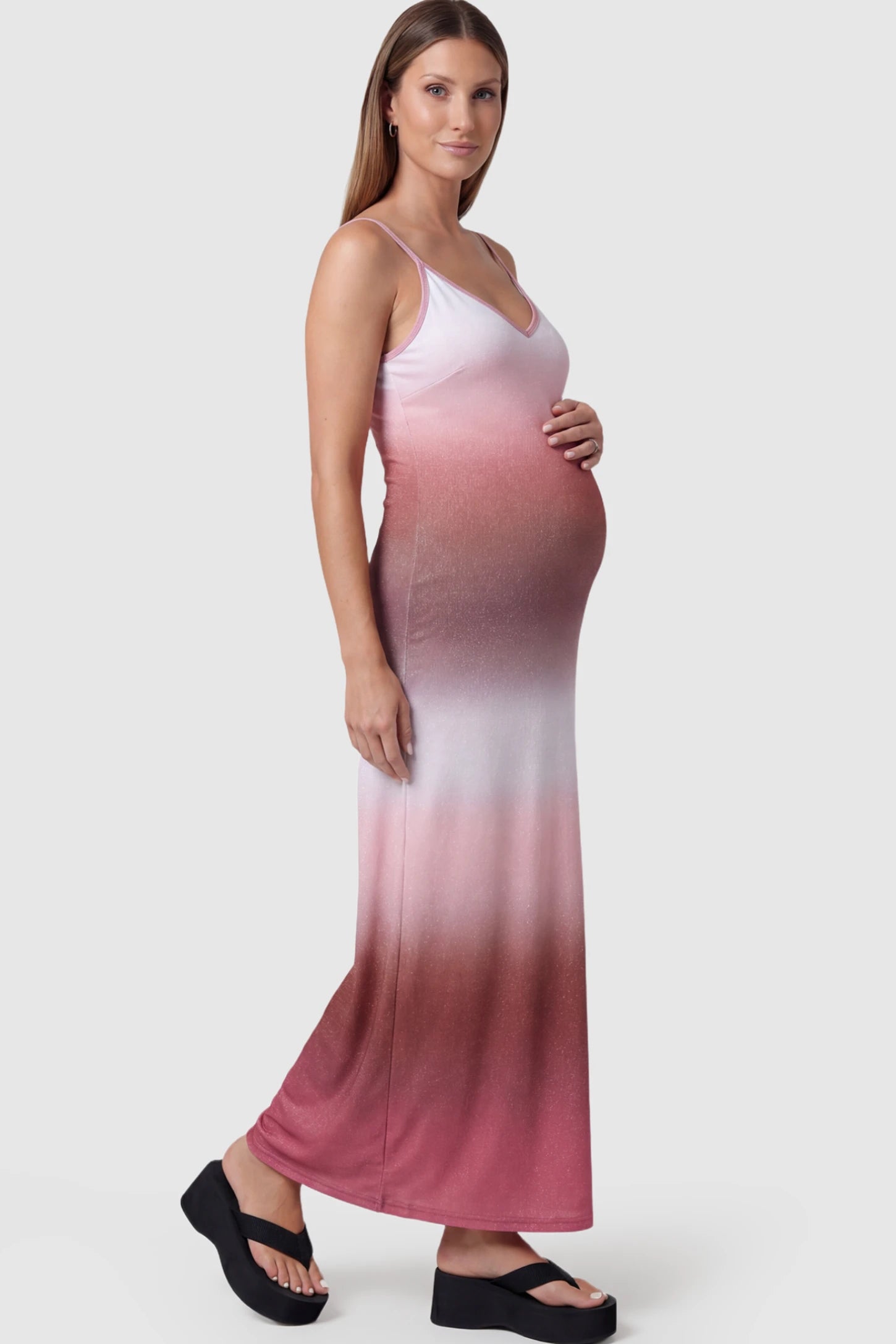 Ombre Print Spaghetti Strap Maternity Maxi Dress in pink and mauve featuring a shimmer finish on a pregnant model.