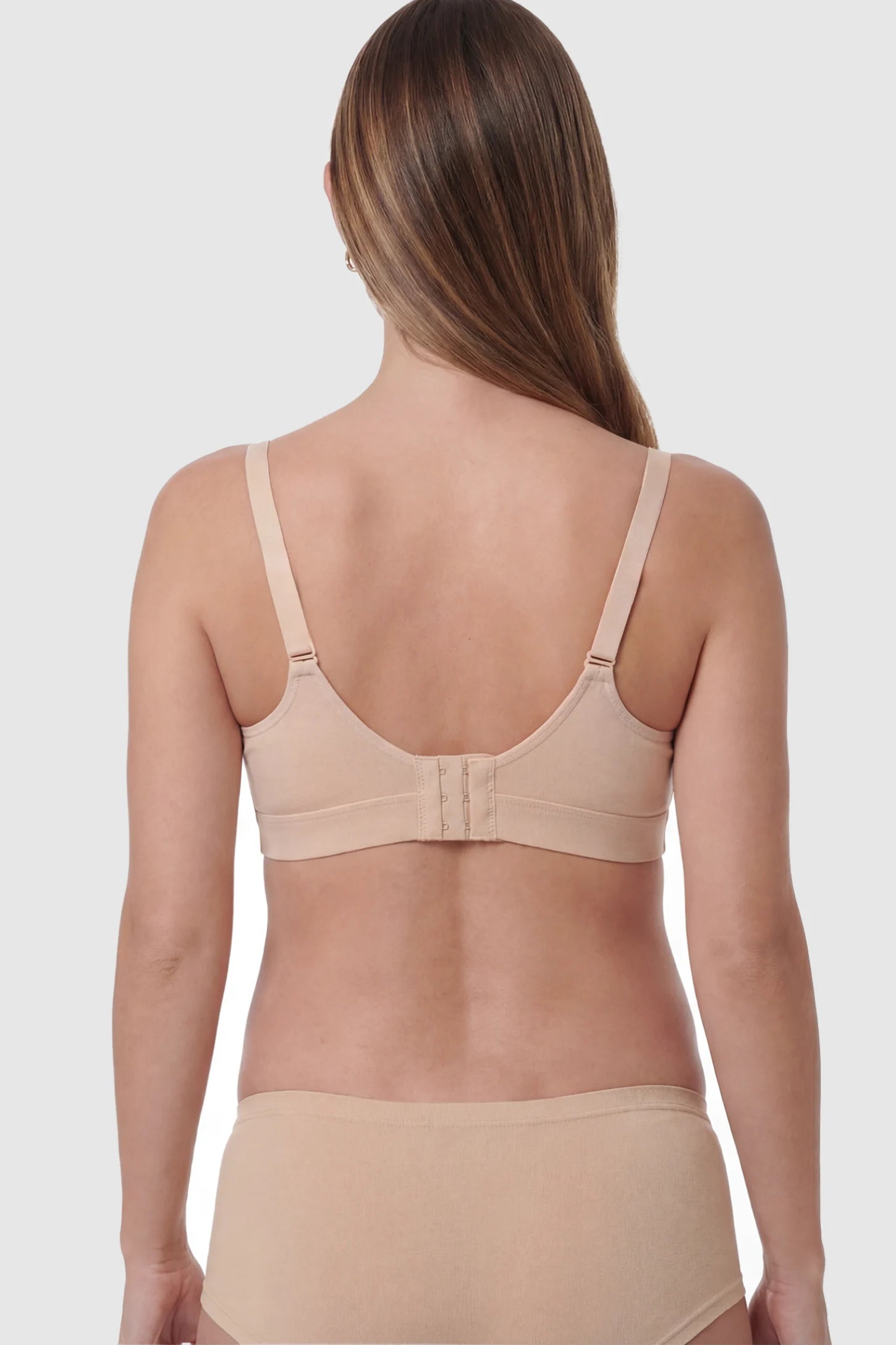 Soft Cotton Front Button Wireless Maternity Nursing Bra Soft Cotton Front-Button Wireless Maternity & Nursing Bra in Skin on a pregnant model.
