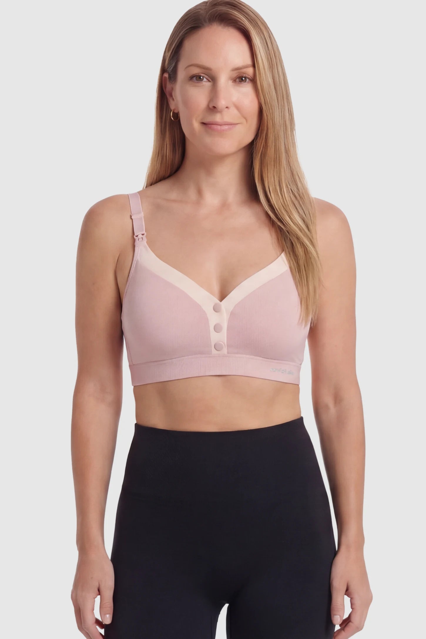 Soft Cotton Front Button Wireless Maternity Nursing Bra Soft Cotton Front-Button Wireless Maternity & Nursing Bra in Pink featuring snap-front access on a postpartum model.