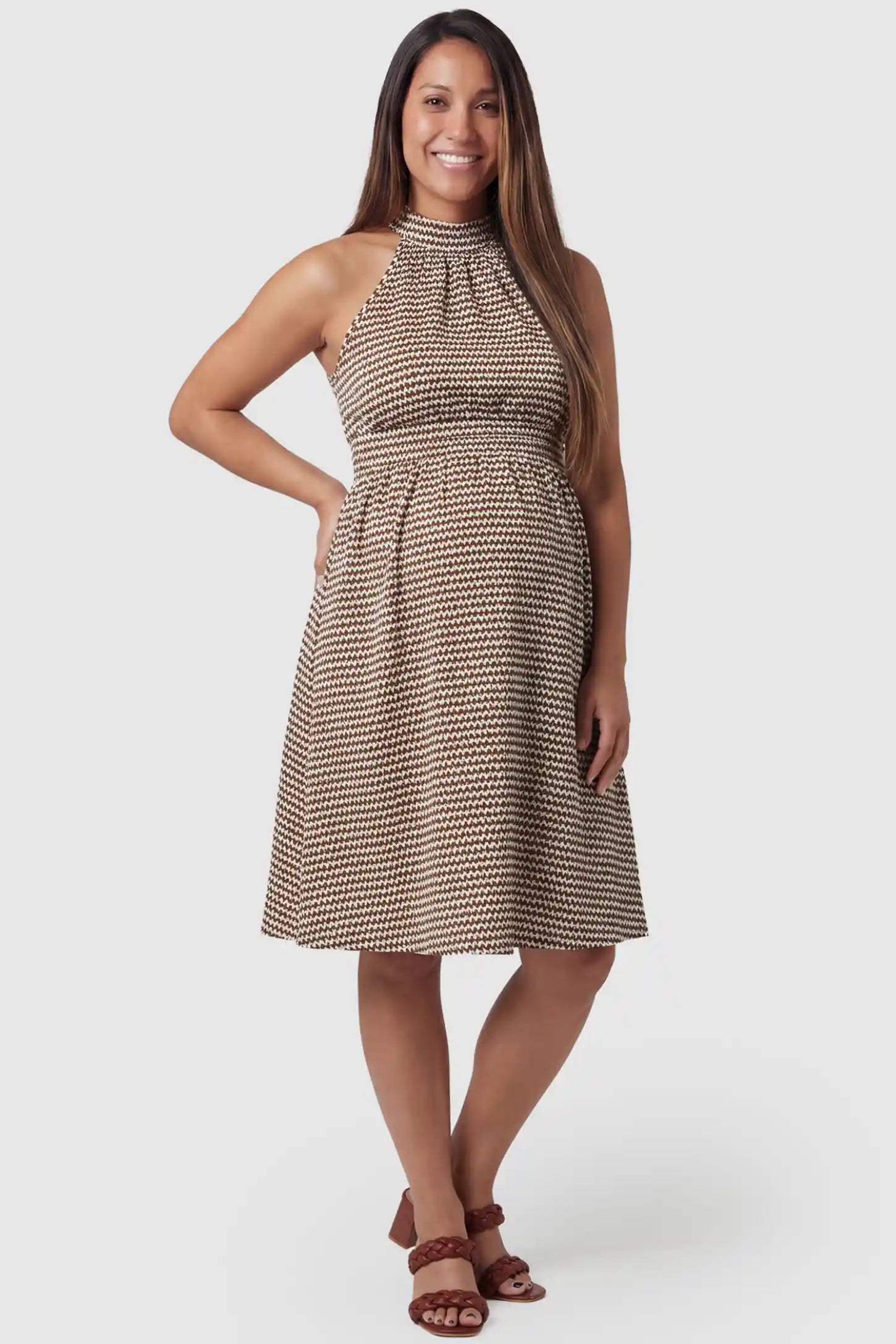 Patterned Print Halter Mock Neck Midi Maternity Dress in Khaki featuring an A-line skirt on a pregnant model in front view.