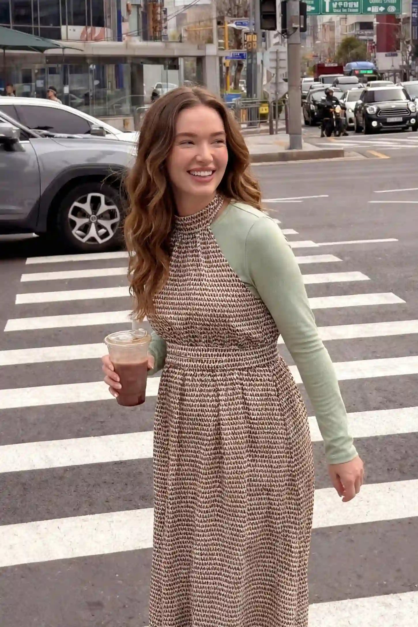 Patterned Print Halter Mock Neck Midi Maternity Dress in Khaki featuring an A-line skirt on a pregnant model in front view.