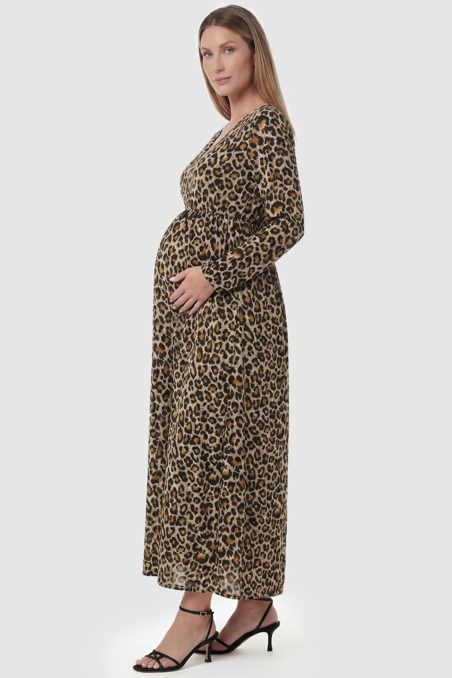 Leopard Print Round Neck Maxi Maternity Dress Leopard Print Round Neck Maxi Maternity Dress in dark leopard print showing the side drape on a pregnant model.