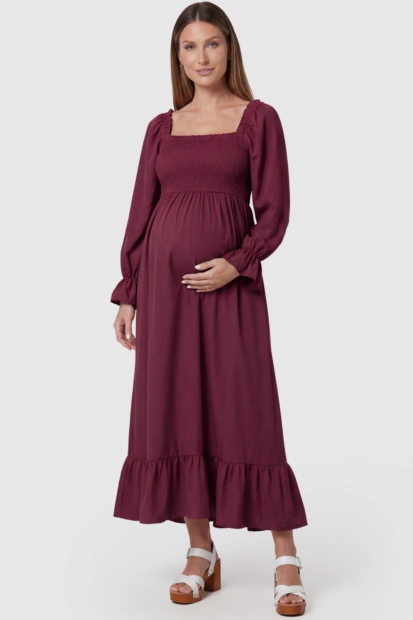 Burgundy Square Neck Ruffle Hem Midi Maternity Dress featuring flared ruffle cuffs on a pregnant model in a front view.