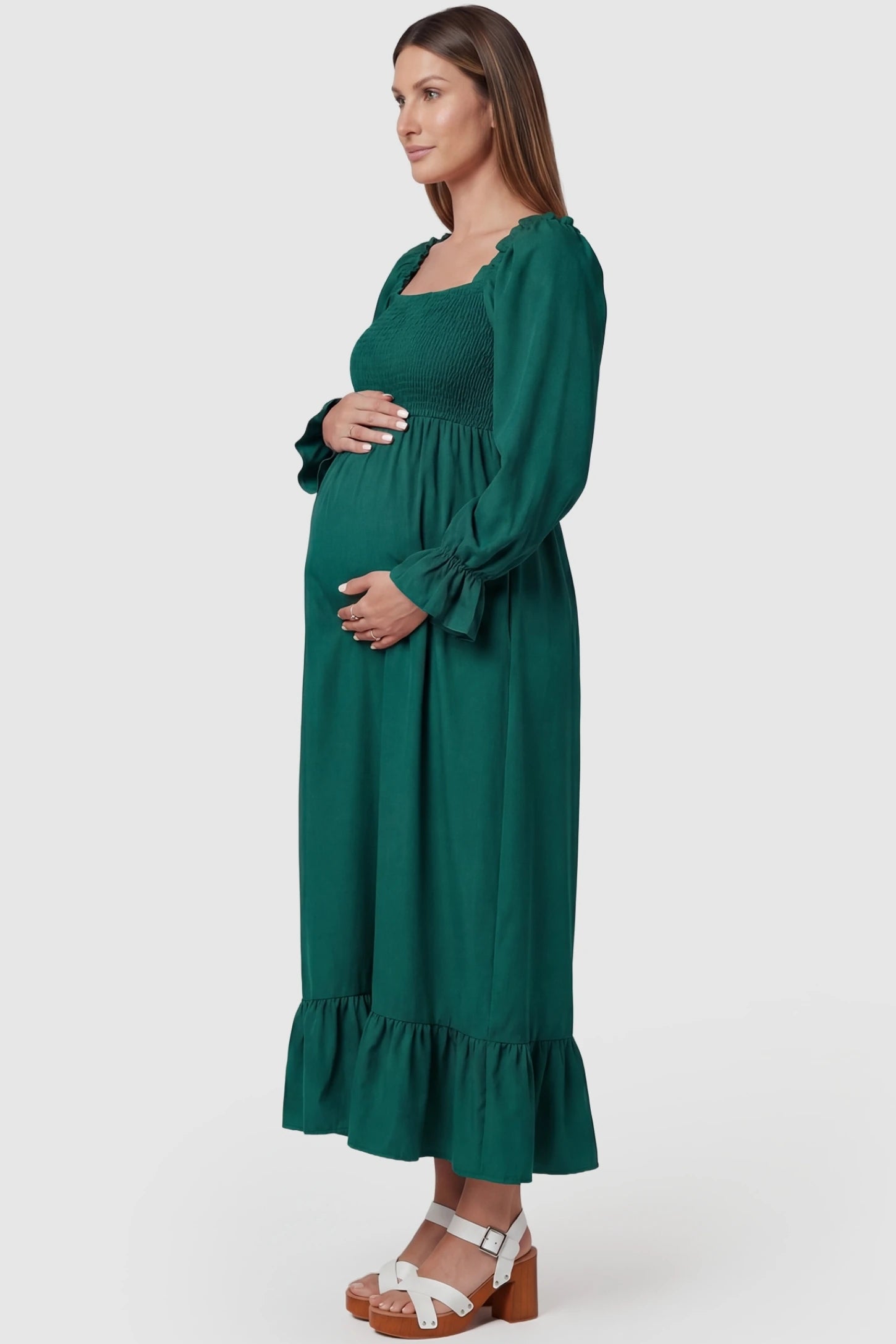 Solid Color Square Neck Ruffle Hem Midi Maternity Dress Green Square Neck Ruffle Hem Midi Maternity Dress featuring elasticized ruffle cuffs on a pregnant model in a side view.