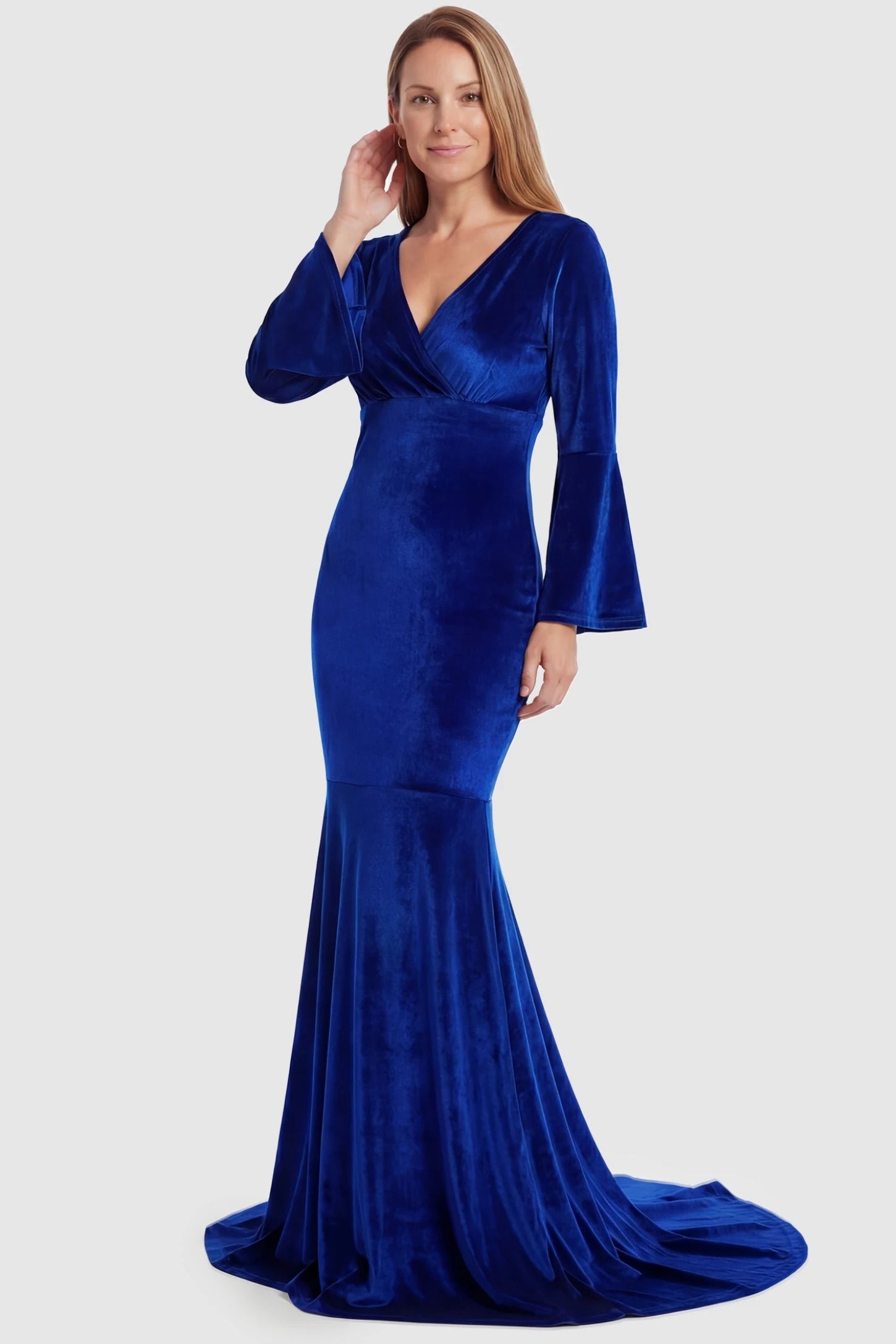 Velvet Long Bell Sleeve Maternity Mermaid Gown Velvet Long Bell Sleeve Maternity Mermaid Gown in Blue featuring a fitted waist on a non-pregnant model.