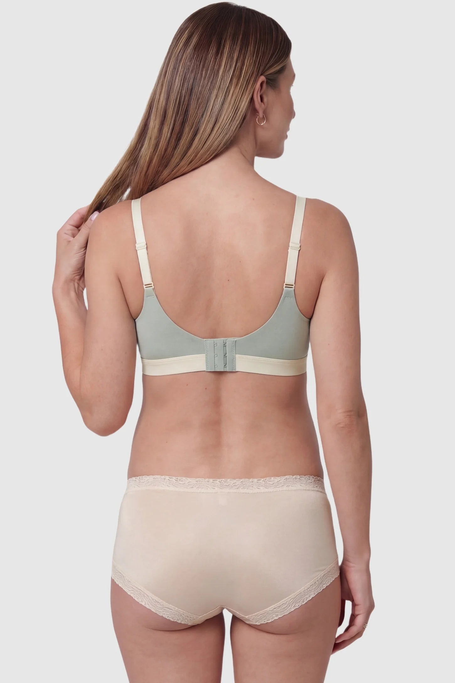 Back view of Wireless Front-Open Lace Maternity Nursing Bra in Green with a 3-row back hook on a pregnant model.