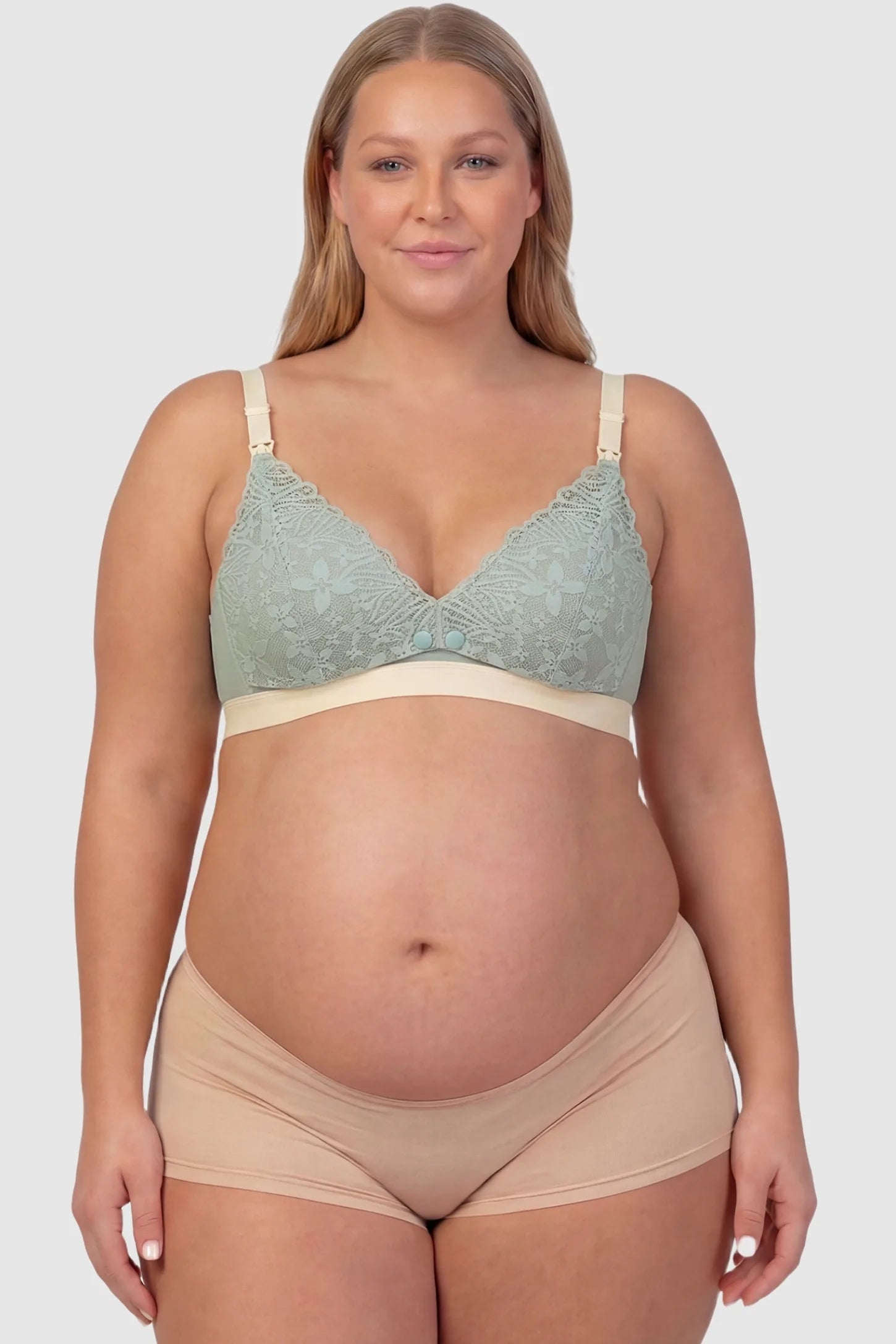 Wireless Front-Open Lace Maternity Nursing Bra Front view of Wireless Front-Open Lace Maternity Nursing Bra in Green with intricate lace on a plus-size pregnant model.