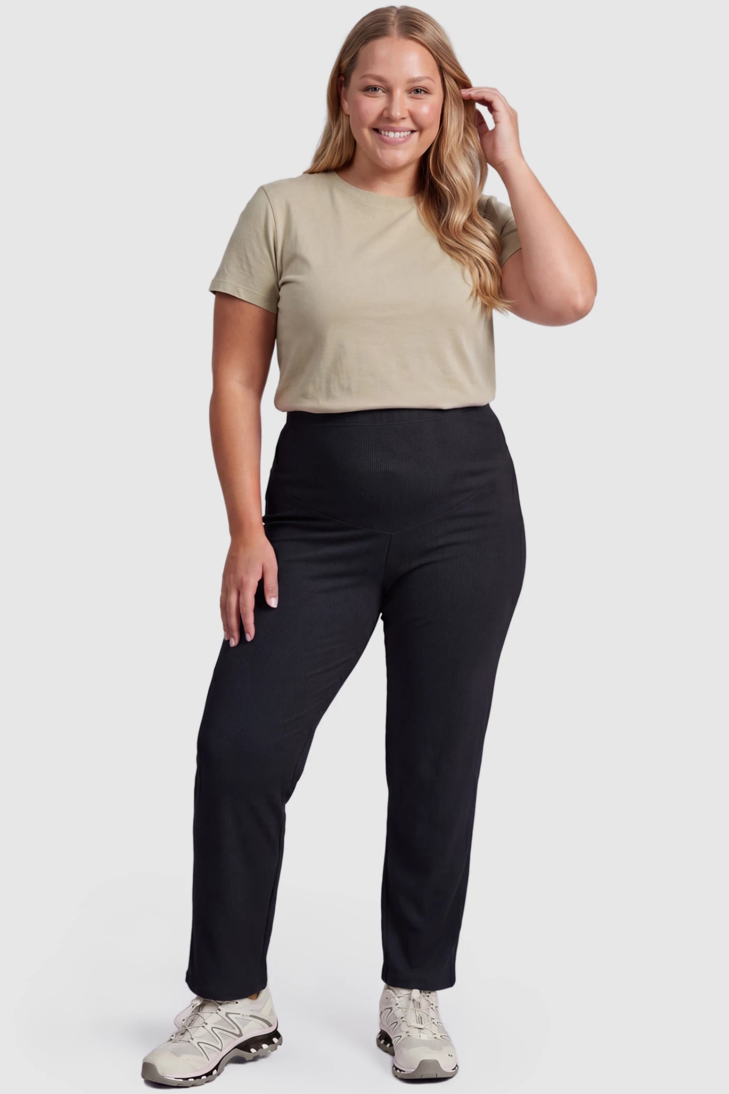 Adjustable Elastic Waist Straight Leg Maternity Pants Straight Leg Maternity Pants in black featuring an adjustable elastic waist on a plus size pregnant model, front view.