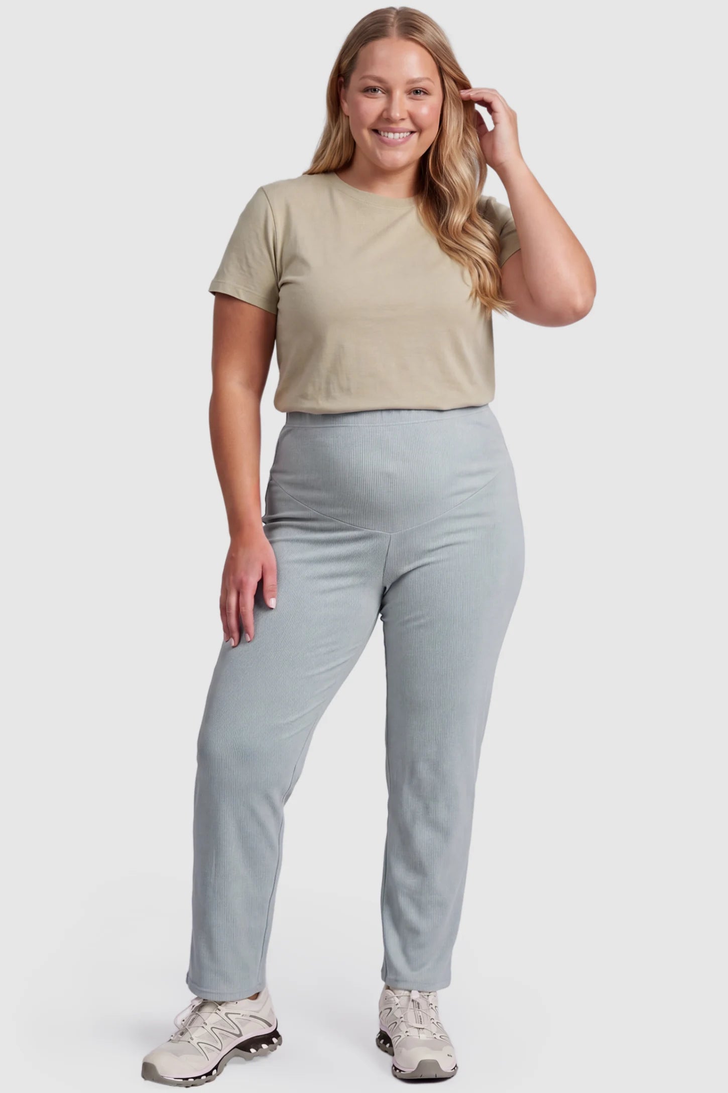 Adjustable Elastic Waist Straight Leg Maternity Pants Straight Leg Maternity Pants in green featuring an adjustable elastic waist on a plus size pregnant model, front view.