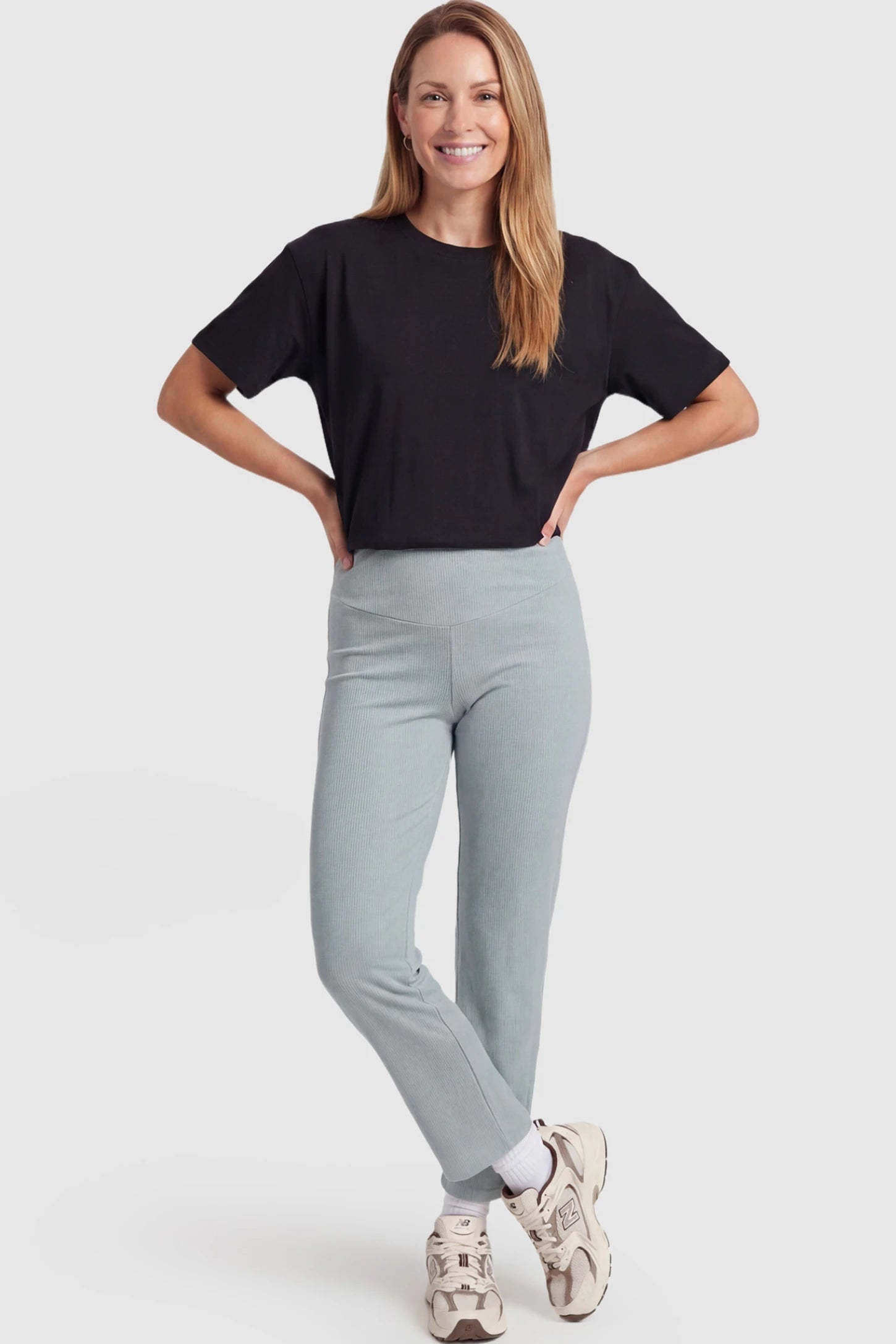 Adjustable Elastic Waist Straight Leg Maternity Pants Straight Leg Maternity Pants in Green featuring an adjustable elastic waist on a postpartum model showing front.