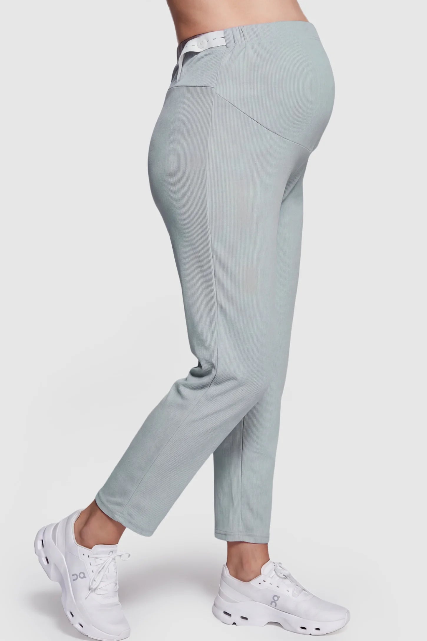 Adjustable Elastic Waist Straight Leg Maternity Pants Straight Leg Maternity Pants in green featuring an adjustable elastic waist on a pregnant model showing side.