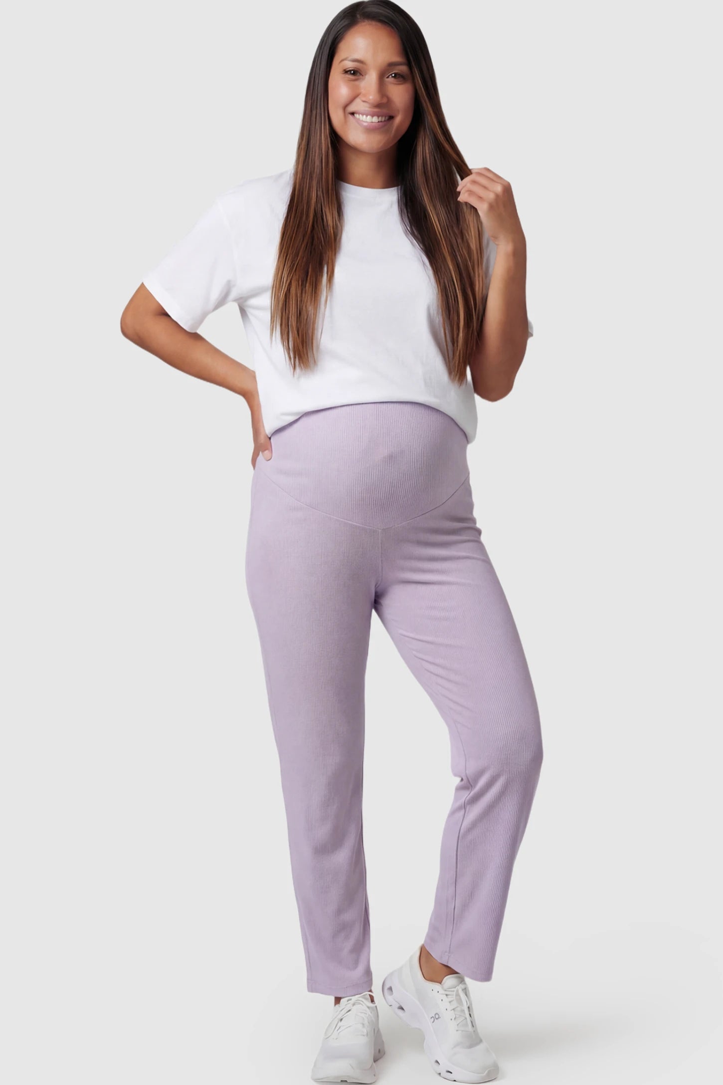 Adjustable Elastic Waist Straight Leg Maternity Pants Straight Leg Maternity Pants in light purple featuring an adjustable elastic waist on a pregnant model posing front.