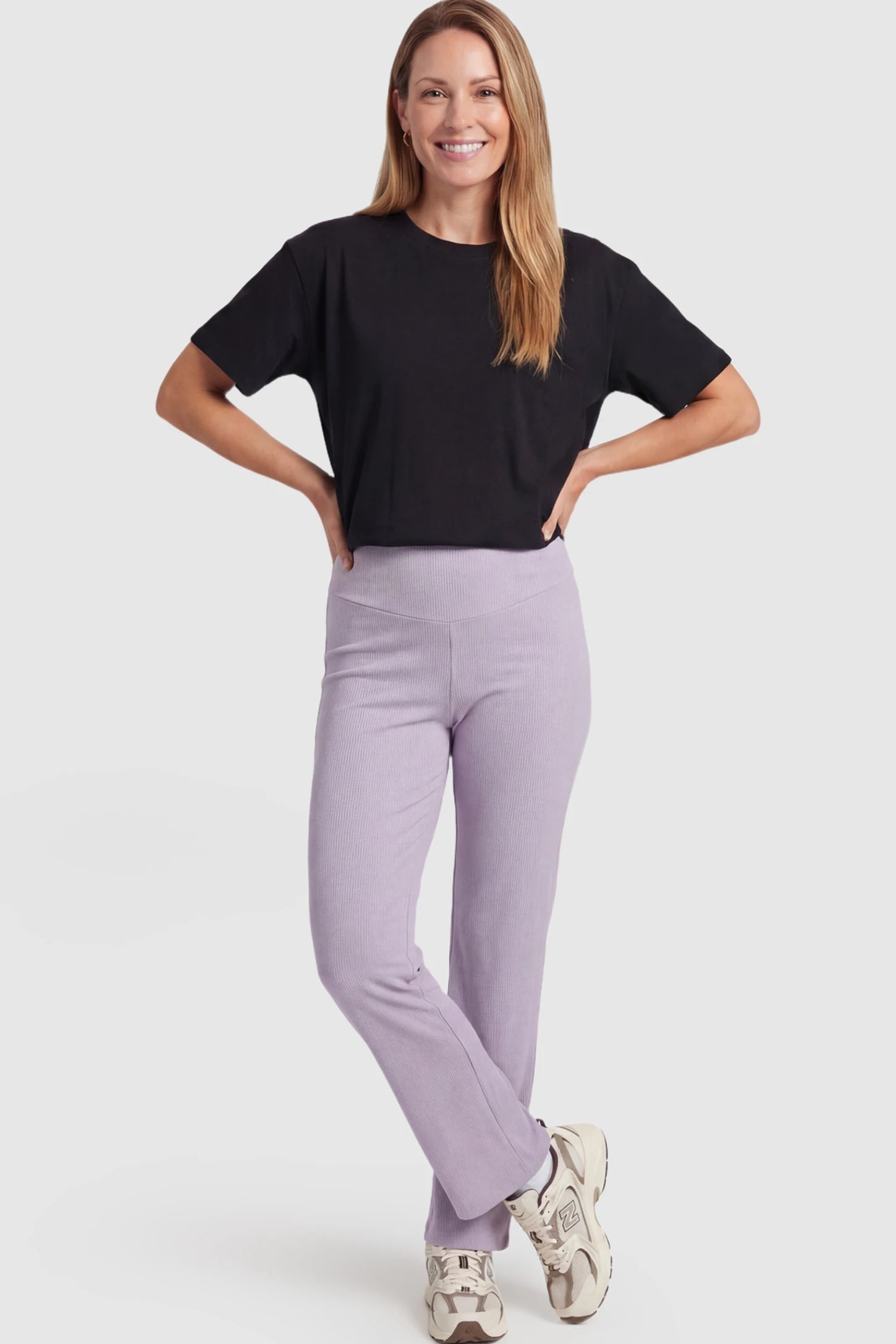 Adjustable Elastic Waist Straight Leg Maternity Pants Straight Leg Maternity Pants in light purple featuring an adjustable elastic waist on a postpartum model showing front.