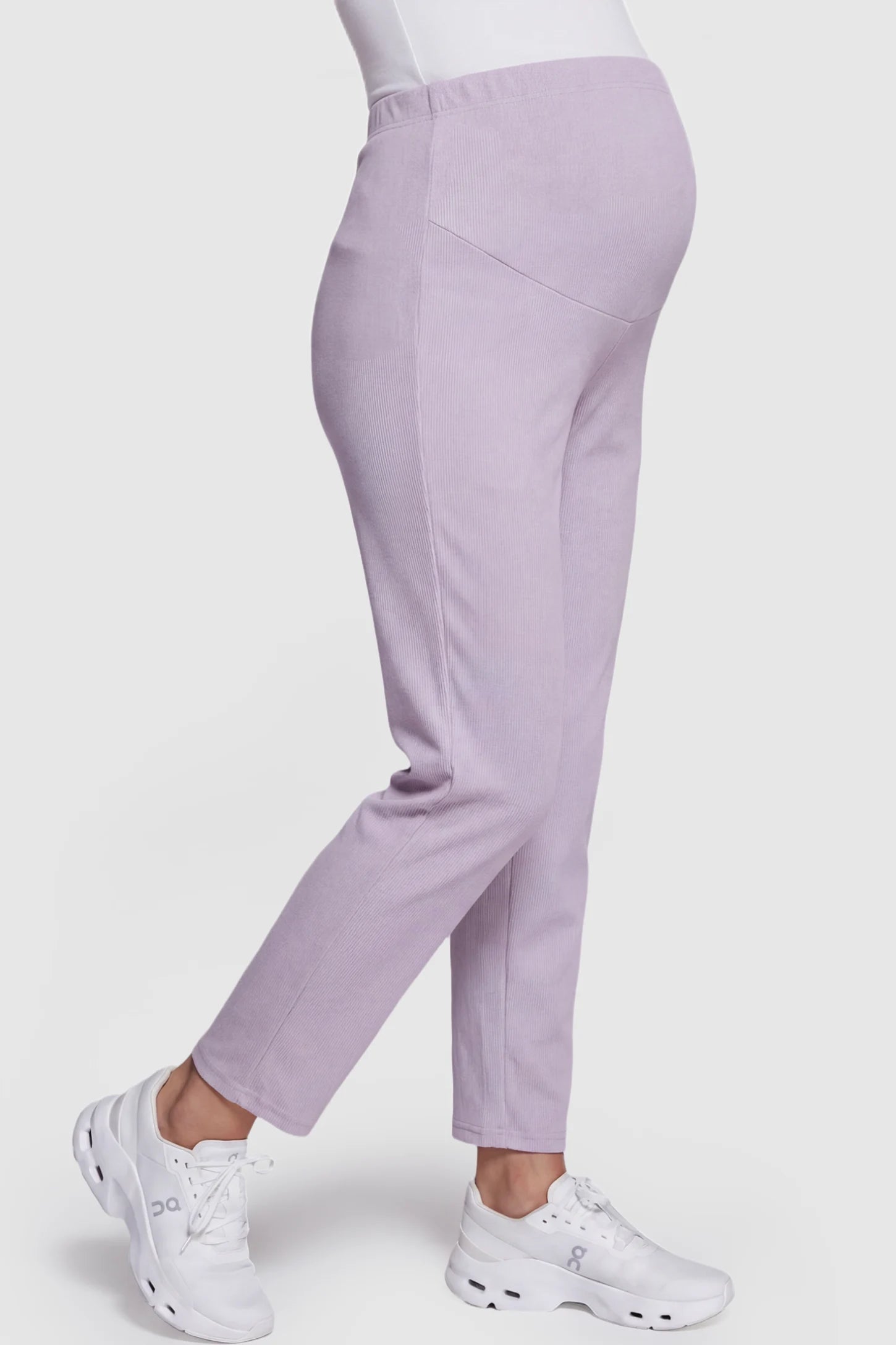 Adjustable Elastic Waist Straight Leg Maternity Pants Straight Leg Maternity Pants in light purple featuring an adjustable elastic waist on a pregnant model showing side.