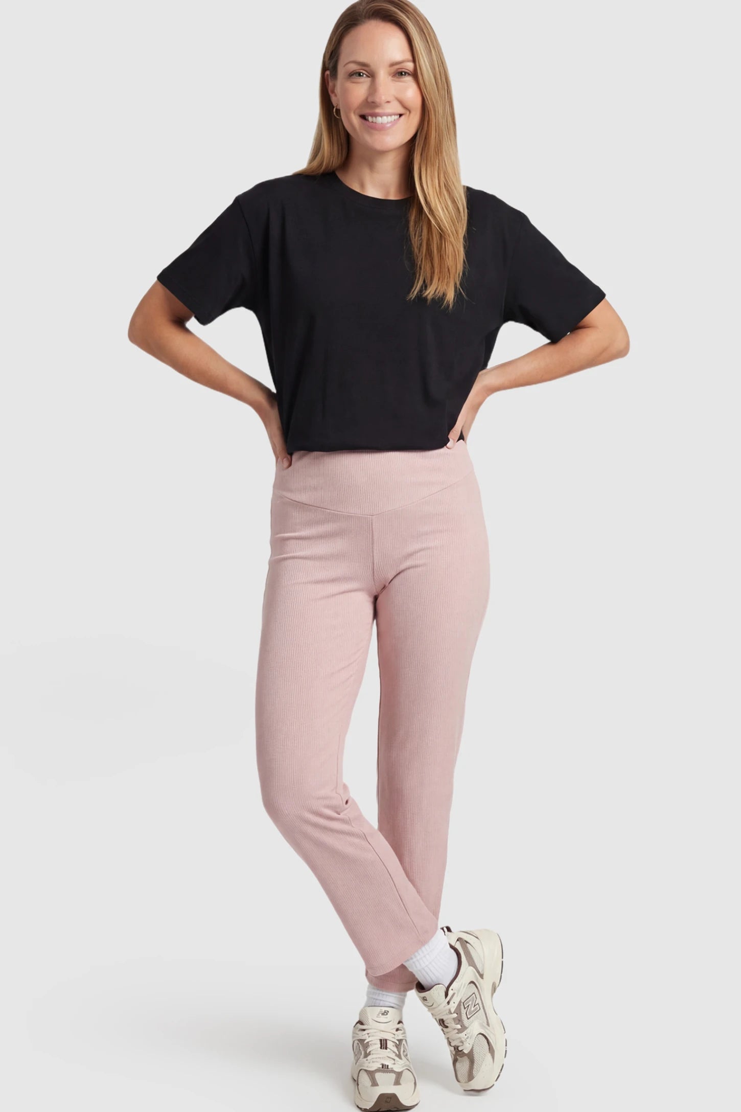 Adjustable Elastic Waist Straight Leg Maternity Pants Straight Leg Maternity Pants in pink featuring an adjustable elastic waist on a postpartum model showing front.