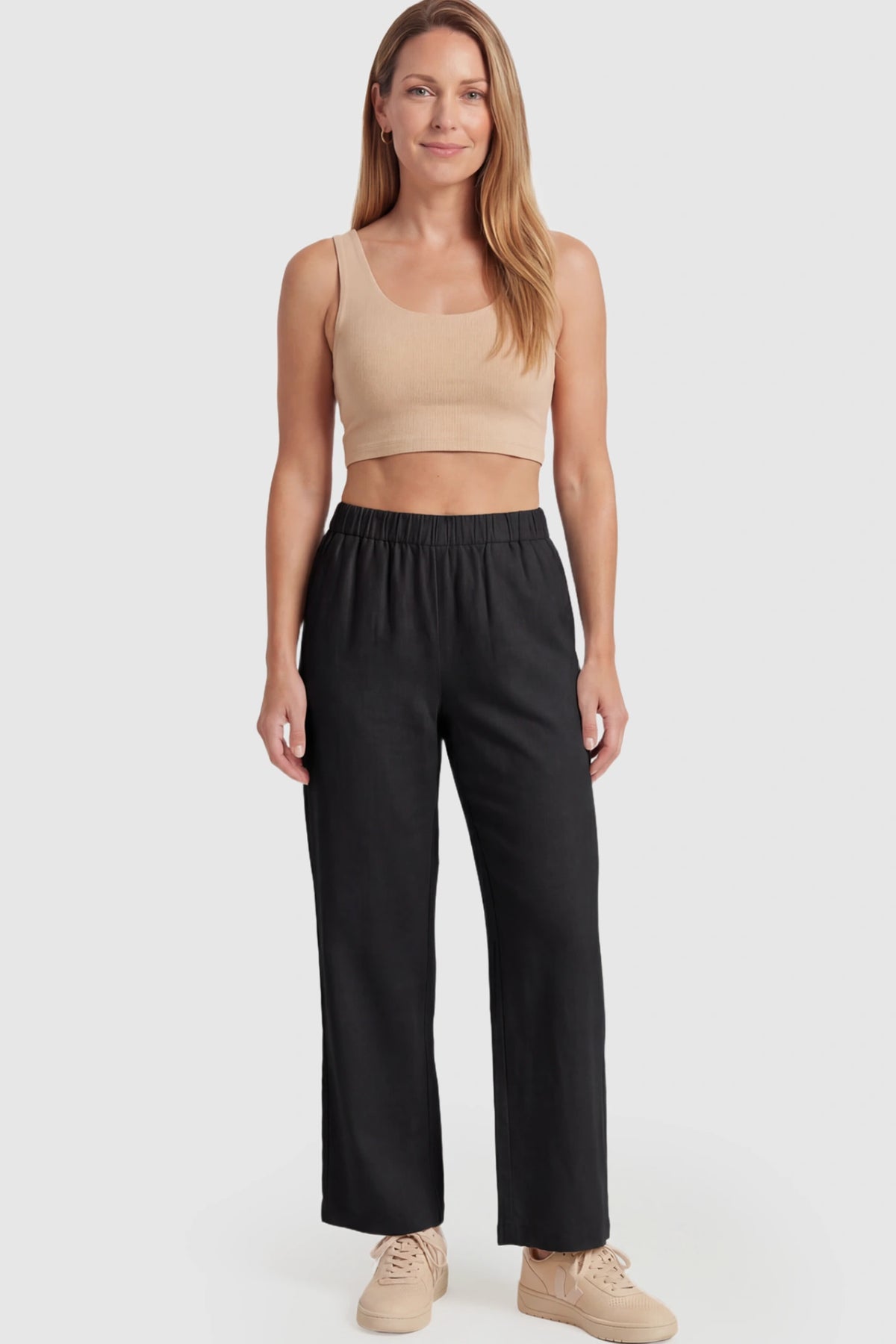 Adjustable Elastic Waist Wide Leg Maternity Pants Adjustable Elastic Waist Wide-Leg Maternity Pants in Black featuring a customizable button-hole waistband on a postpartum model facing front.