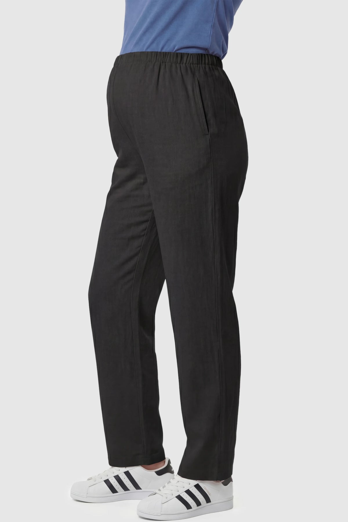 Adjustable Elastic Waist Wide Leg Maternity Pants Adjustable Elastic Waist Wide-Leg Maternity Pants in Black featuring a customizable button-hole waistband on a pregnant model showing side.