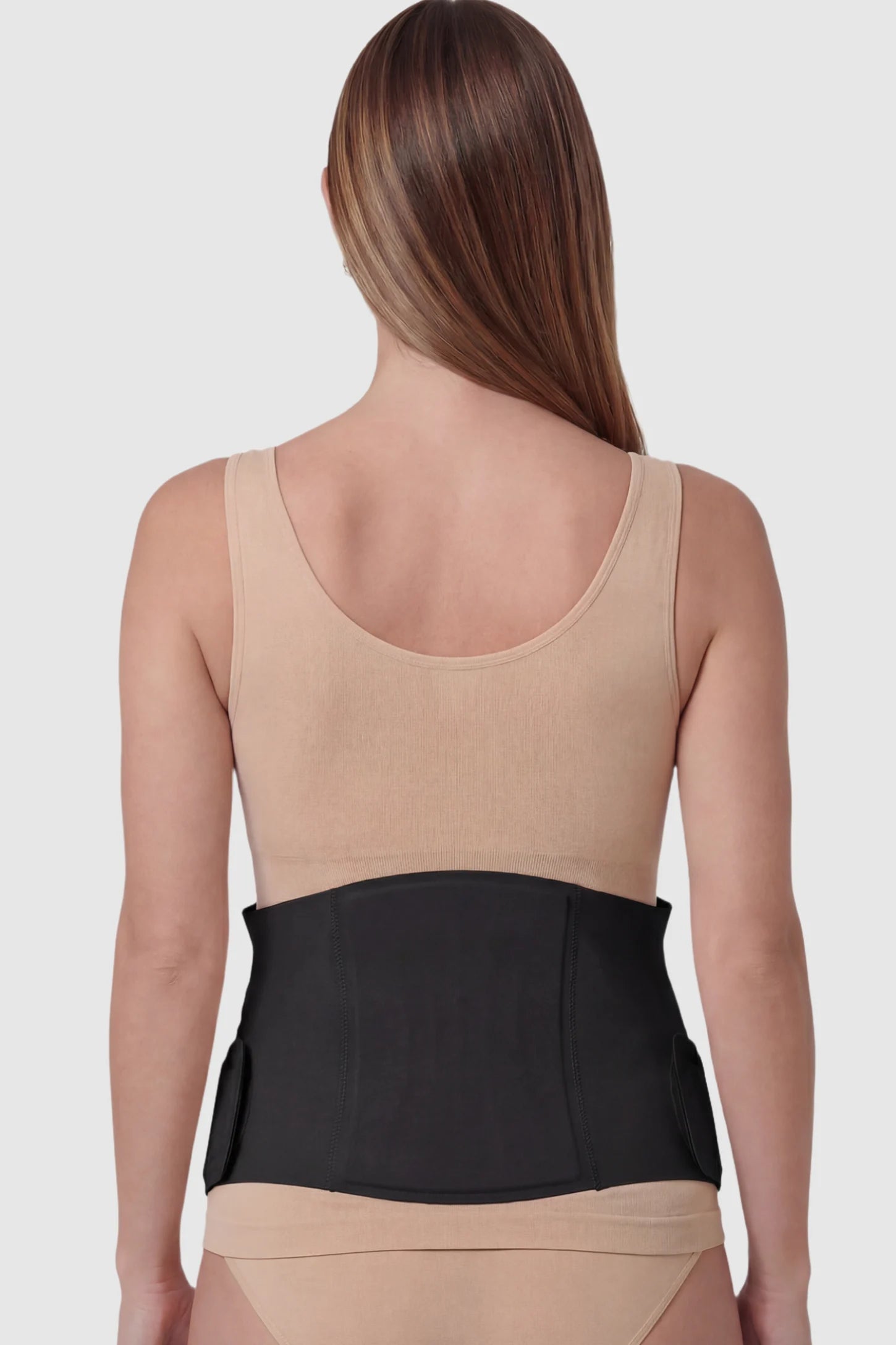 Adjustable Ergonomic Maternity Belly Support Band Adjustable Ergonomic Maternity Belly Support Band in Black featuring an adjustable ergonomic design on a pregnant model showing back.