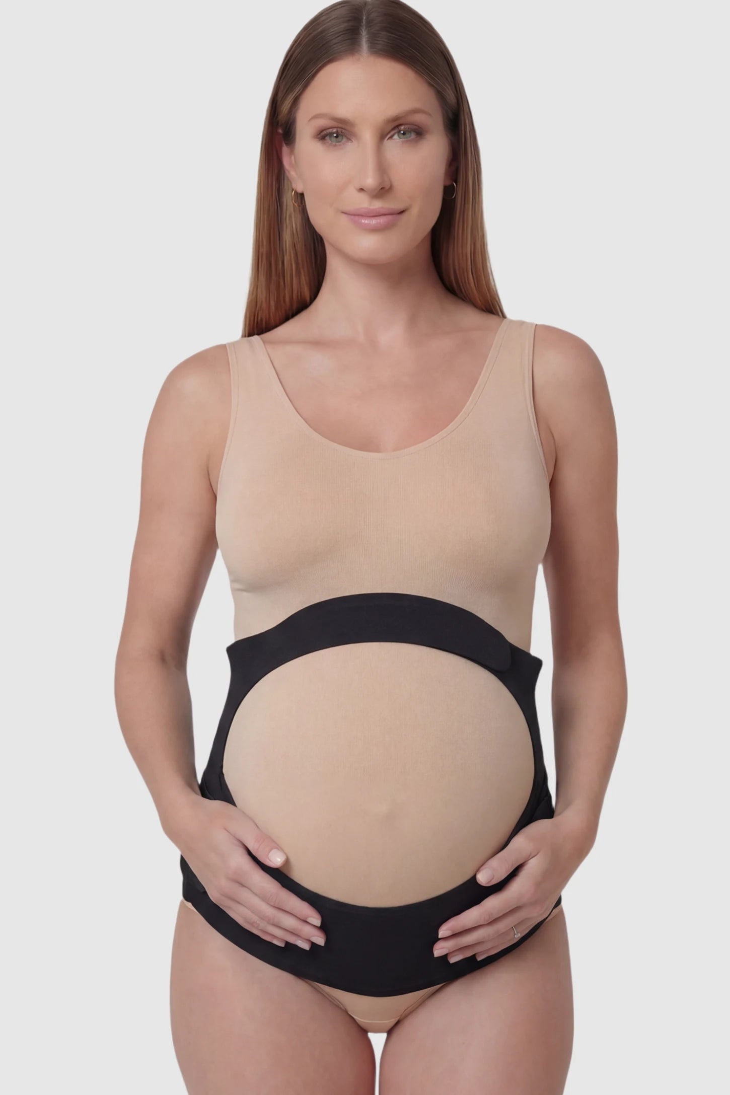 Adjustable Ergonomic Maternity Belly Support Band Adjustable Ergonomic Maternity Belly Support Band in Black featuring an adjustable ergonomic dual-strap design on a pregnant model showing front.