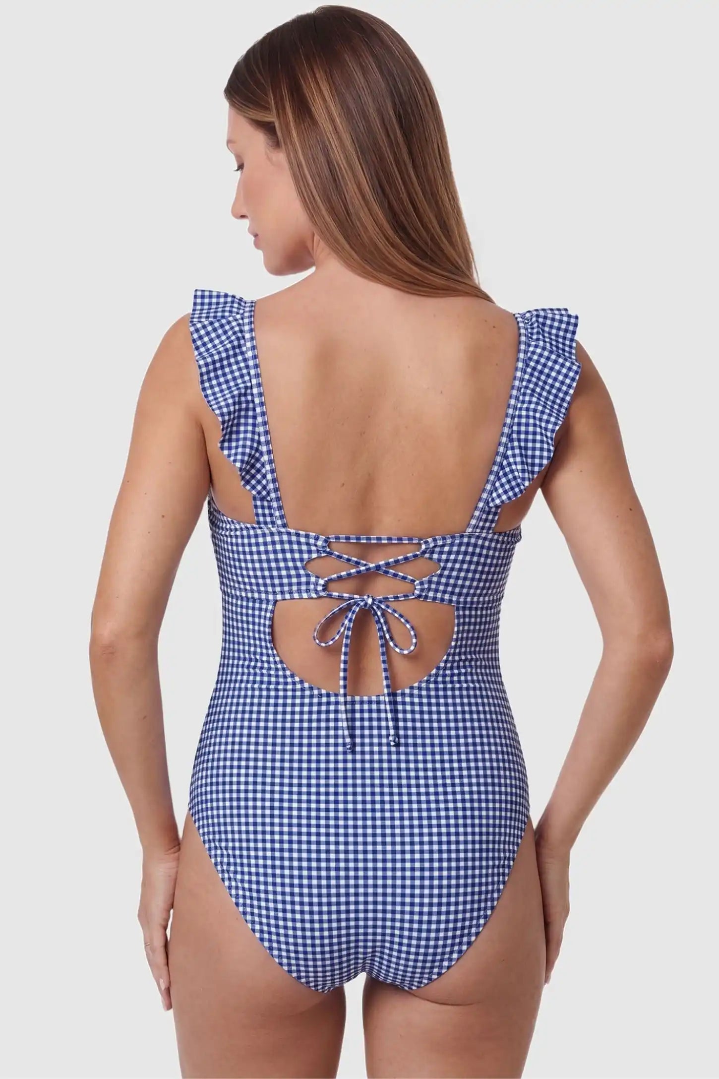 Adjustable Tie-Back V-Neck Maternity One-Piece Swimsuit Adjustable Tie-Back V-Neck Maternity Swimsuit in Blue Gingham featuring adjustable back ties on a pregnant model back view.