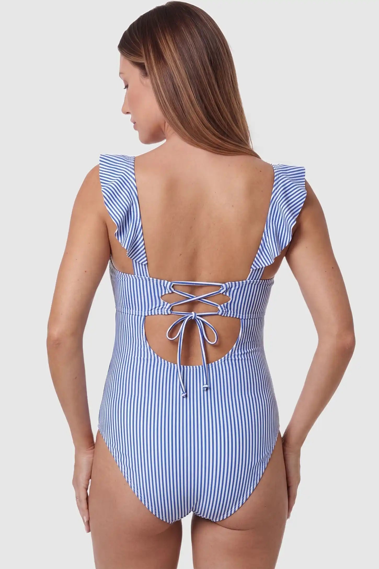 Adjustable Tie-Back V-Neck Maternity One-Piece Swimsuit Adjustable Tie-Back V-Neck Maternity Swimsuit in Blue Striped featuring a tie back closure on a back view on a pregnant model.