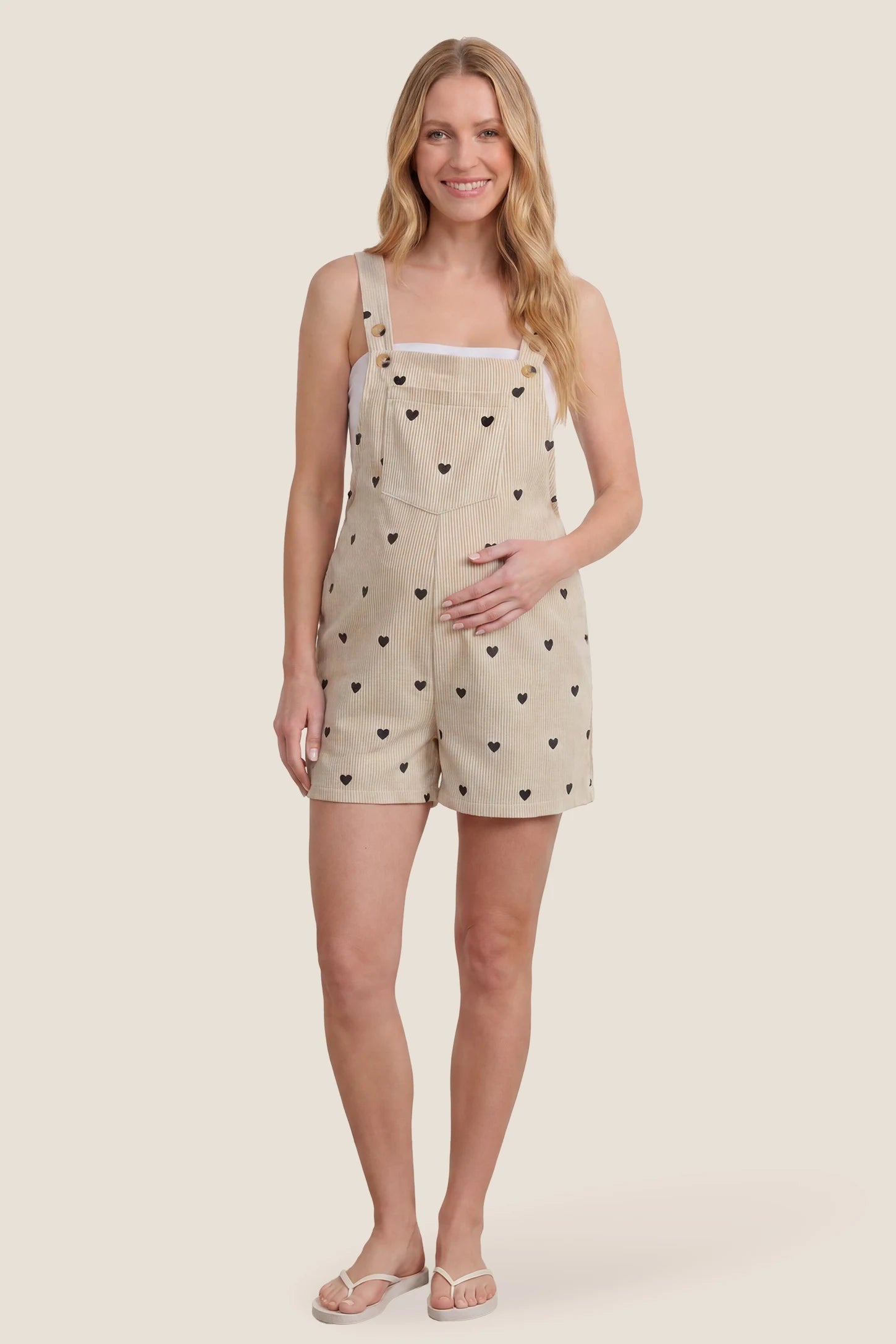 Adjustable Waist Front Pocket Maternity Short Overalls Full body view of the black Adjustable Waist Front Pocket Maternity Short Overalls designed for comfortable maternity styling.
