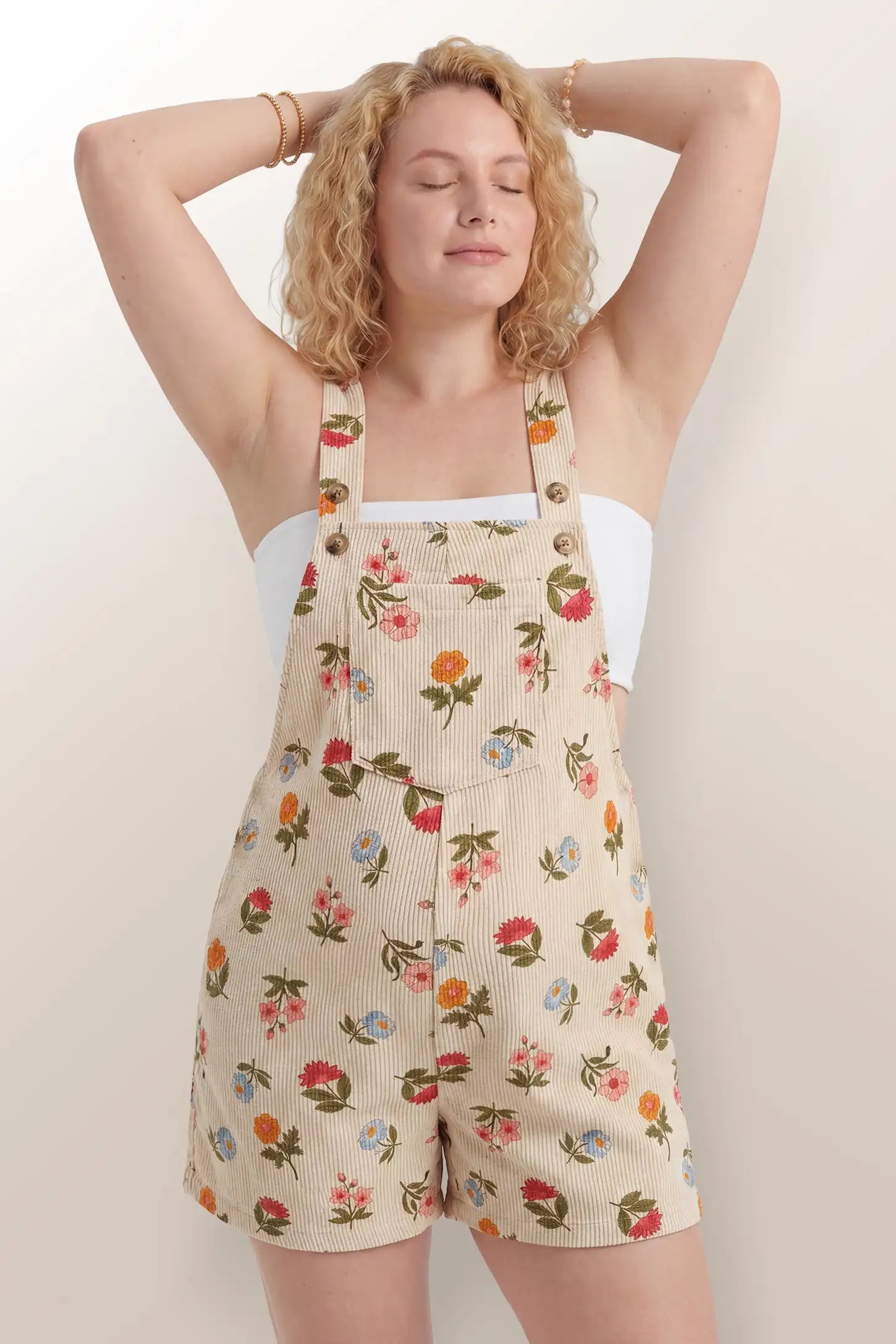 Adjustable Waist Front Pocket Maternity Short Overalls Postpartum front view of the floral Adjustable Waist Front Pocket Maternity Short Overalls with a relaxed and flattering fit.