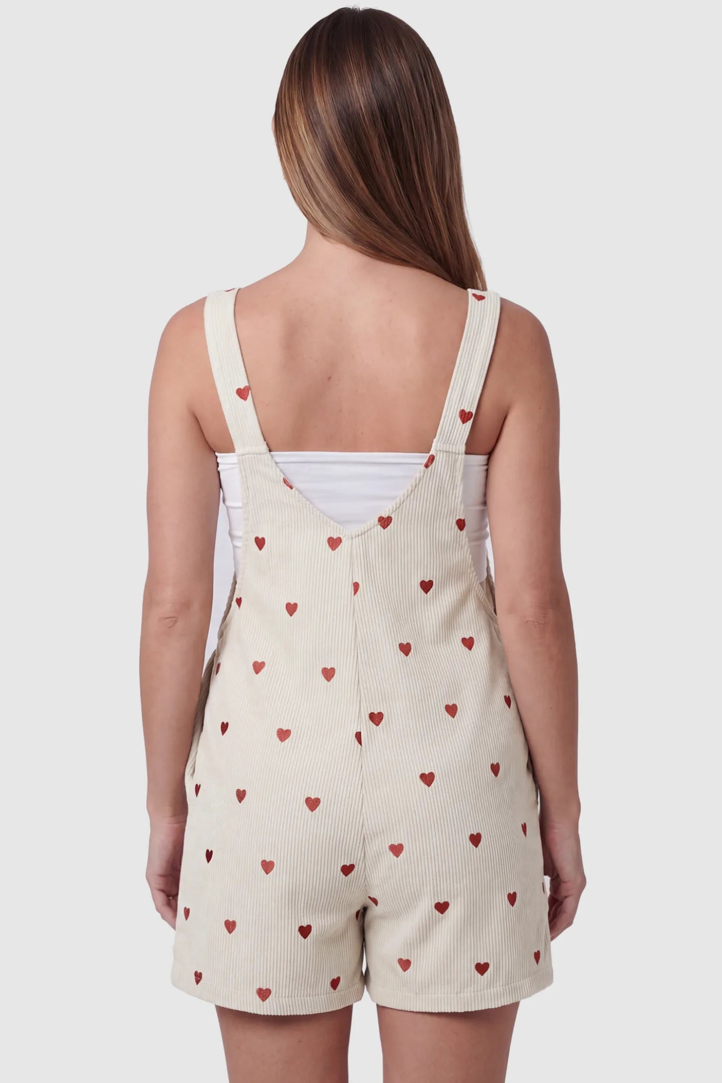 Adjustable Waist Front Pocket Maternity Short Overalls Adjustable Waist Front Pocket Maternity Short Overalls in red featuring cross-back straps on a pregnant model, back view.