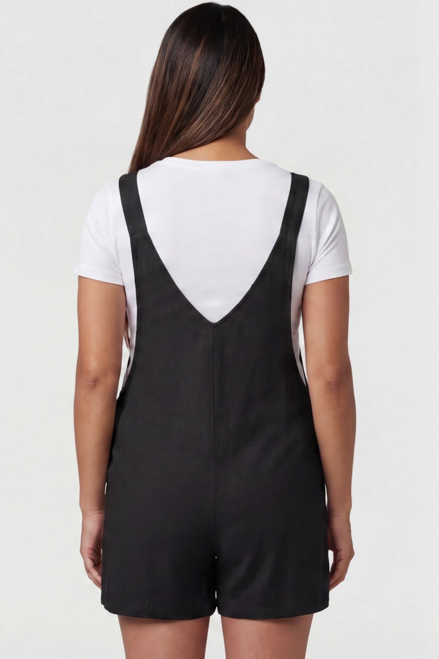 Adjustable Waist Pocketed Maternity Short Overalls Adjustable Waist Pocketed Maternity Short Overalls in Black featuring a V-shaped back and wide straps on a model, back view.