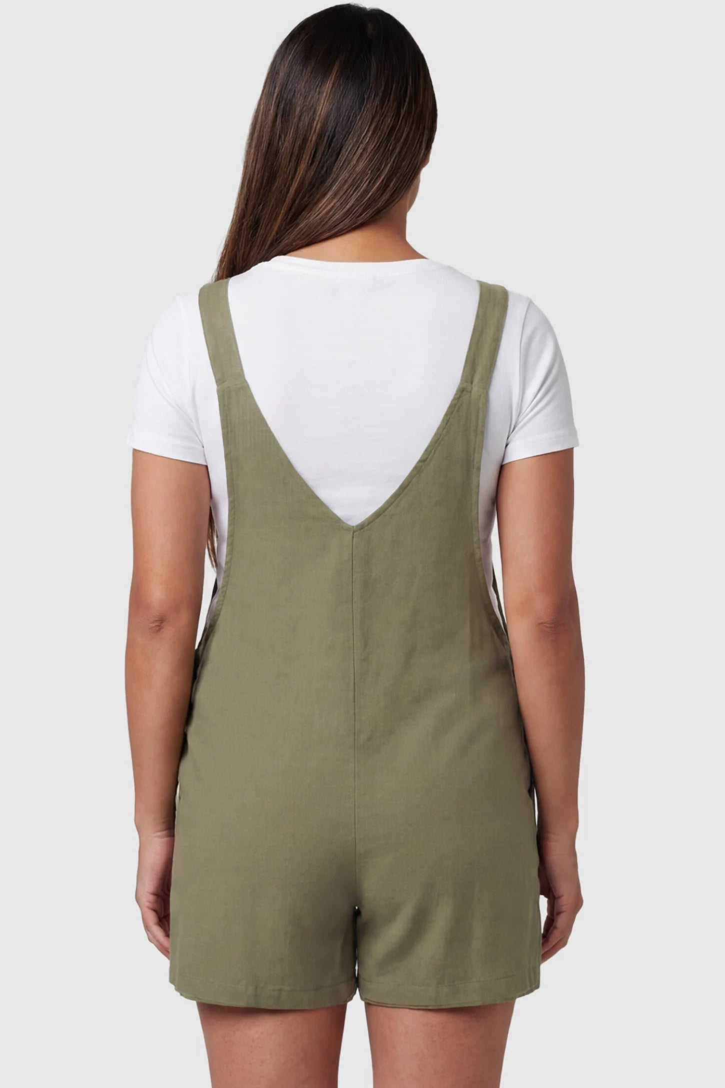 Adjustable Waist Pocketed Maternity Short Overalls Adjustable Waist Pocketed Maternity Short Overalls in Green featuring a V-shaped back and wide straps on a model, back view.