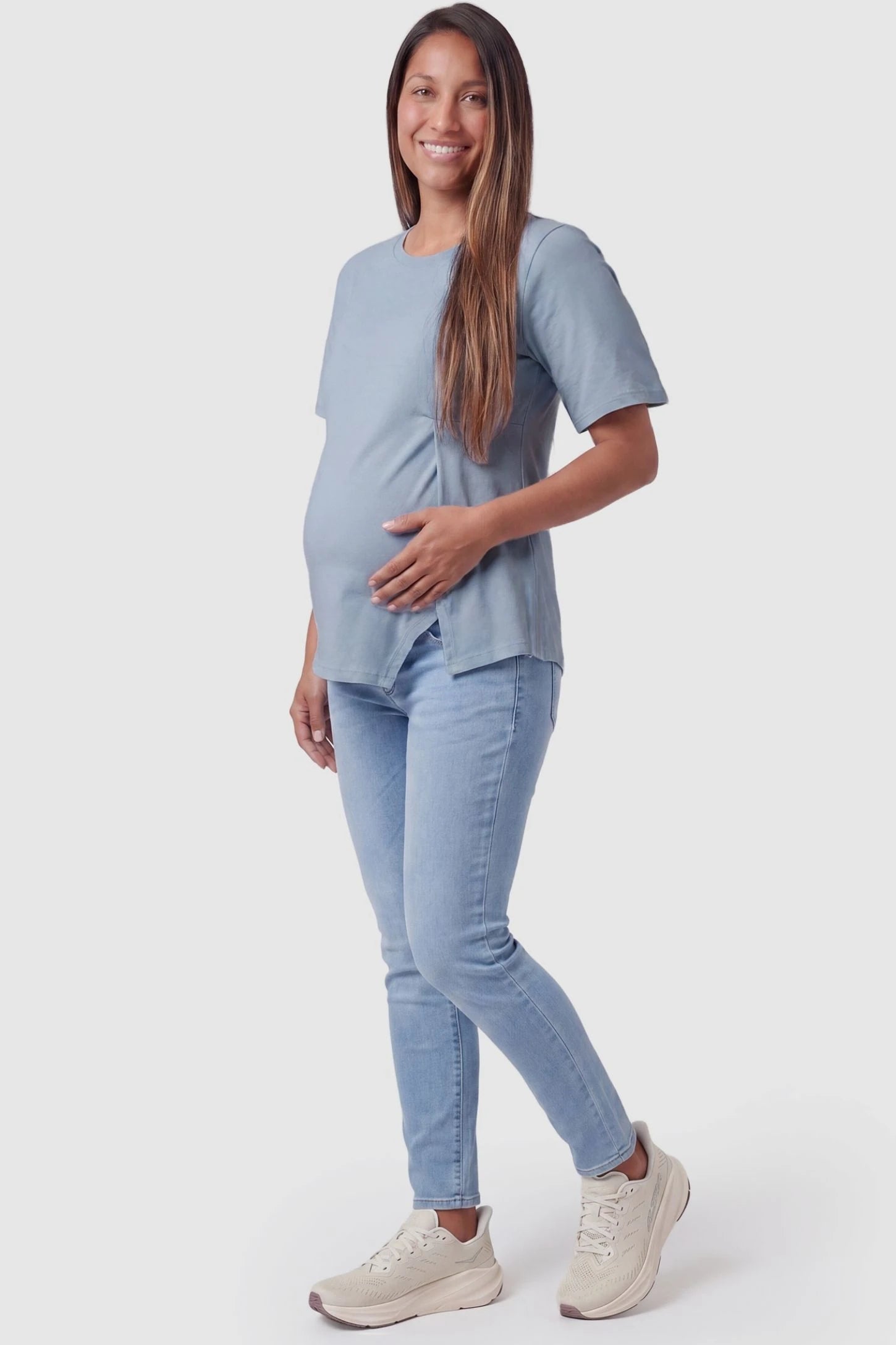 Asymmetrical Hem Relaxed Short Sleeve Maternity Top Full body view of Asymmetrical Hem Relaxed Short Sleeve Maternity Top in Blue featuring a draped silhouette on a pregnant model.