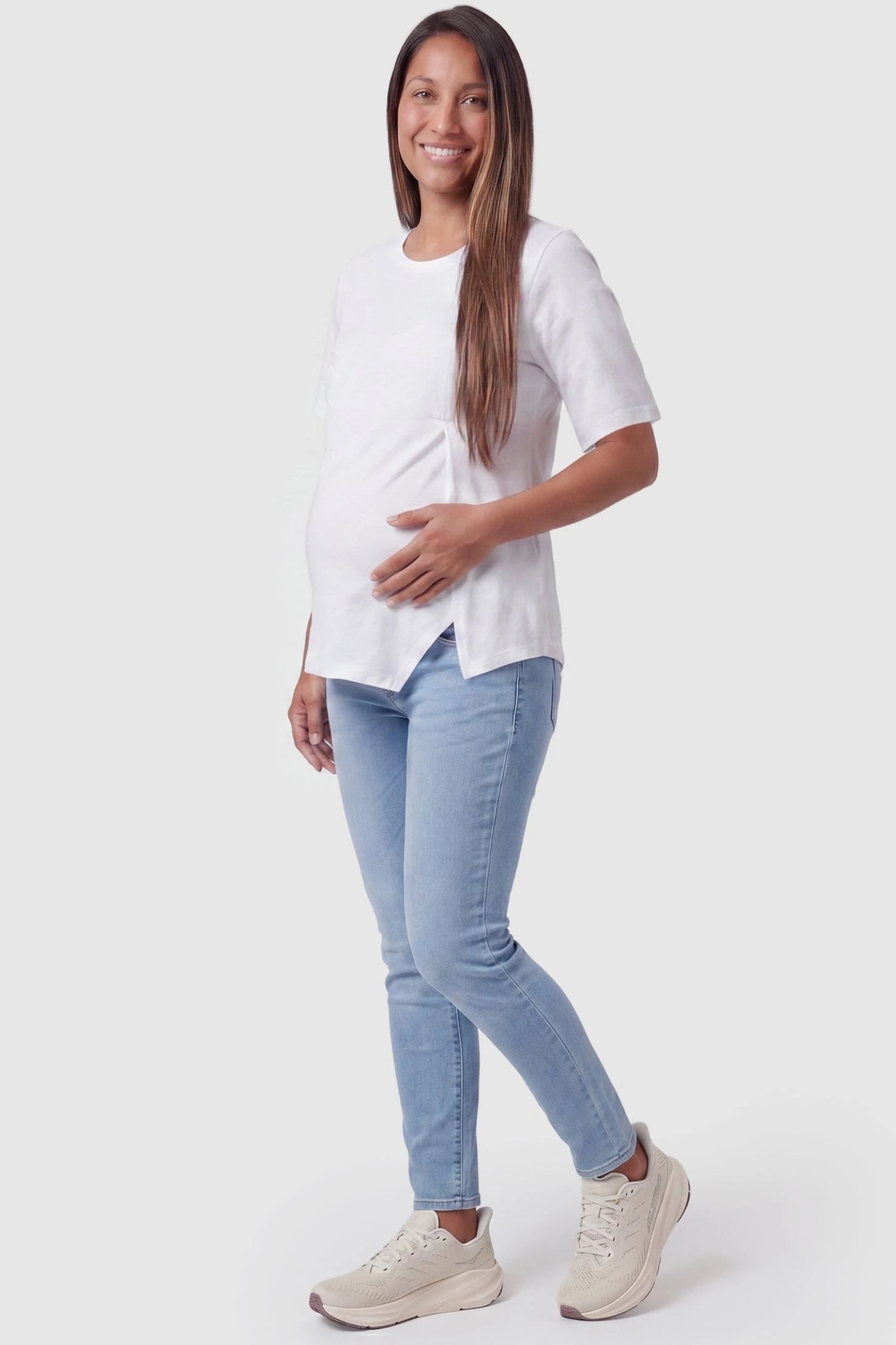 Asymmetrical Hem Relaxed Short Sleeve Maternity Top Full body view of Asymmetrical Hem Relaxed Short Sleeve Maternity Top in White featuring a draped silhouette on a pregnant model.