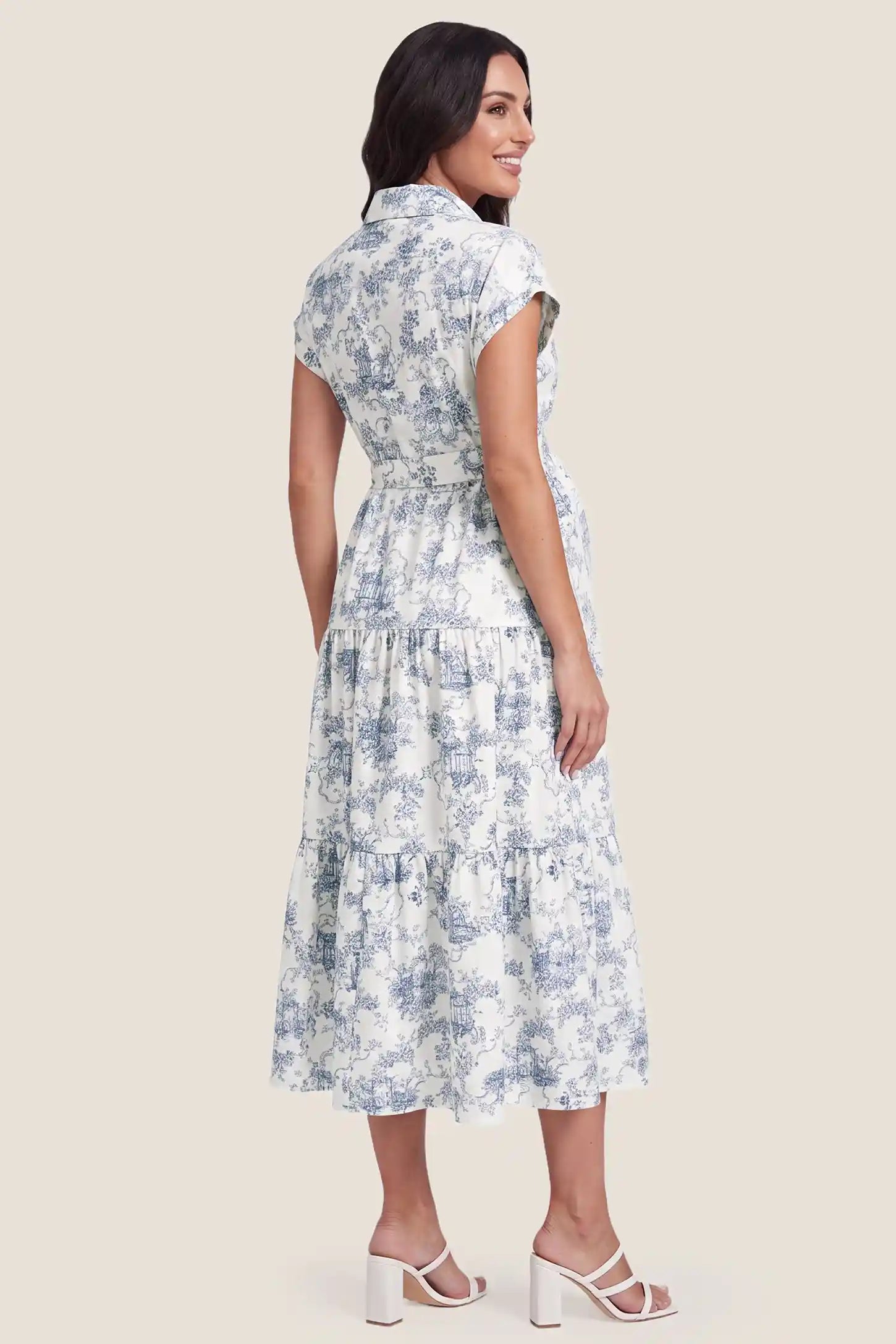 Belted V-Neck Tiered Chiffon Maternity Dress Belted V-Neck Tiered Chiffon Maternity Dress in Blue Toile highlighting the tiered skirt and belt, back view on a pregnant model.