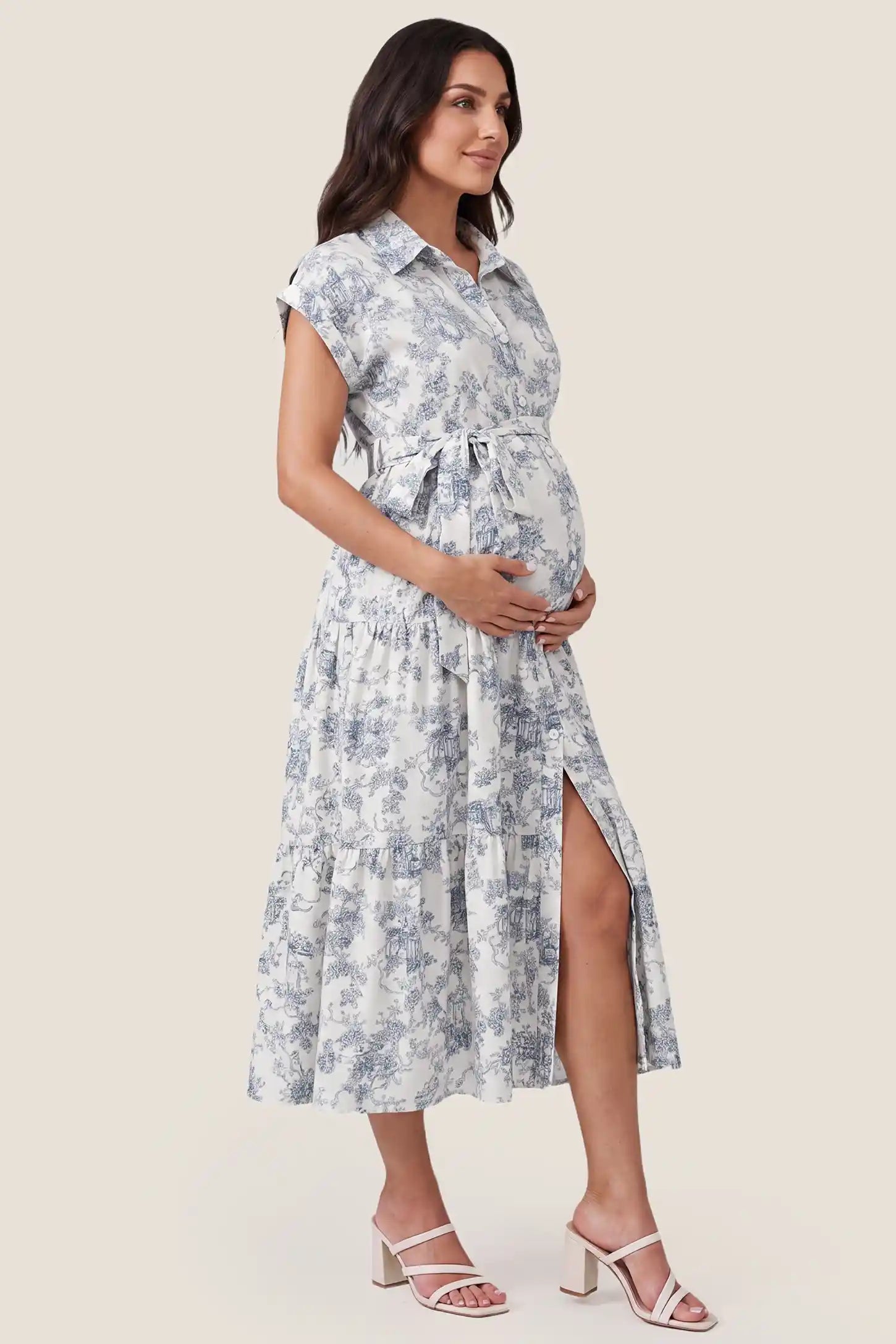 Belted V-Neck Tiered Chiffon Maternity Dress Belted V-Neck Tiered Chiffon Maternity Dress in Blue Toile showcasing the flattering silhouette, side view on a pregnant model.
